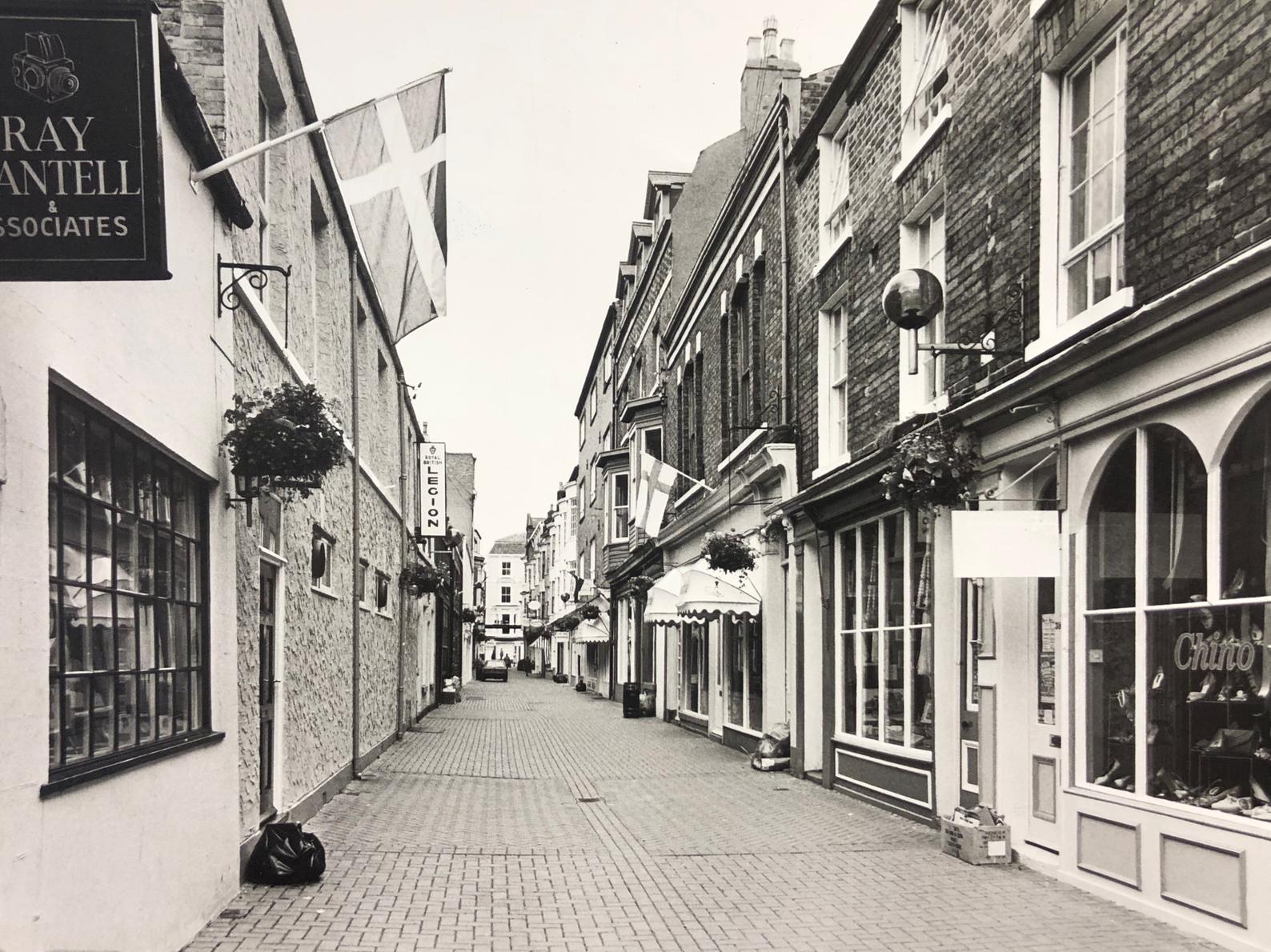 A view up Bar Street towards Newborough in 1985. The Chino store on the right is where Chique Shoes now is.