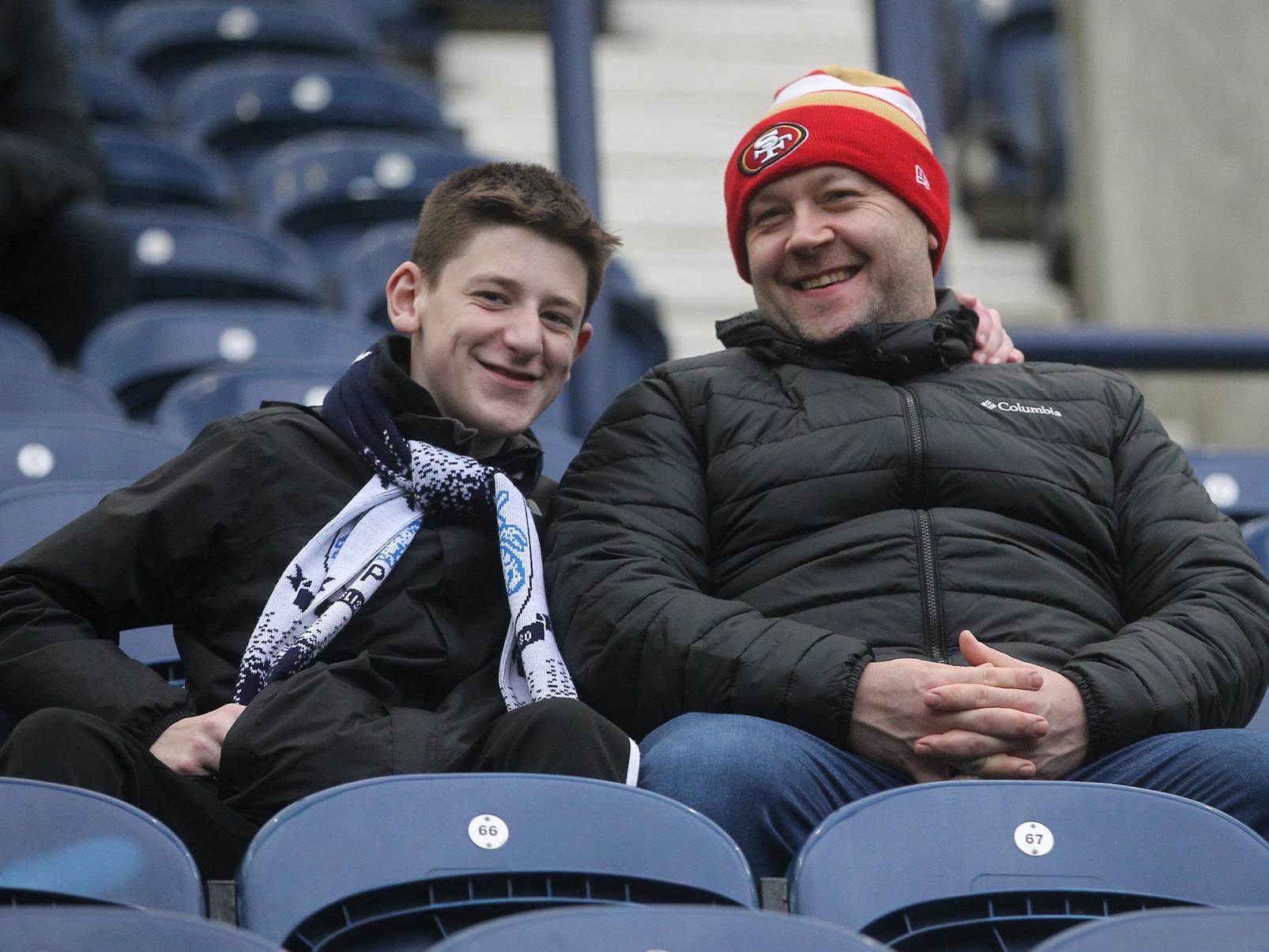 Two PNE fans pose for the camera ahead of kick off.