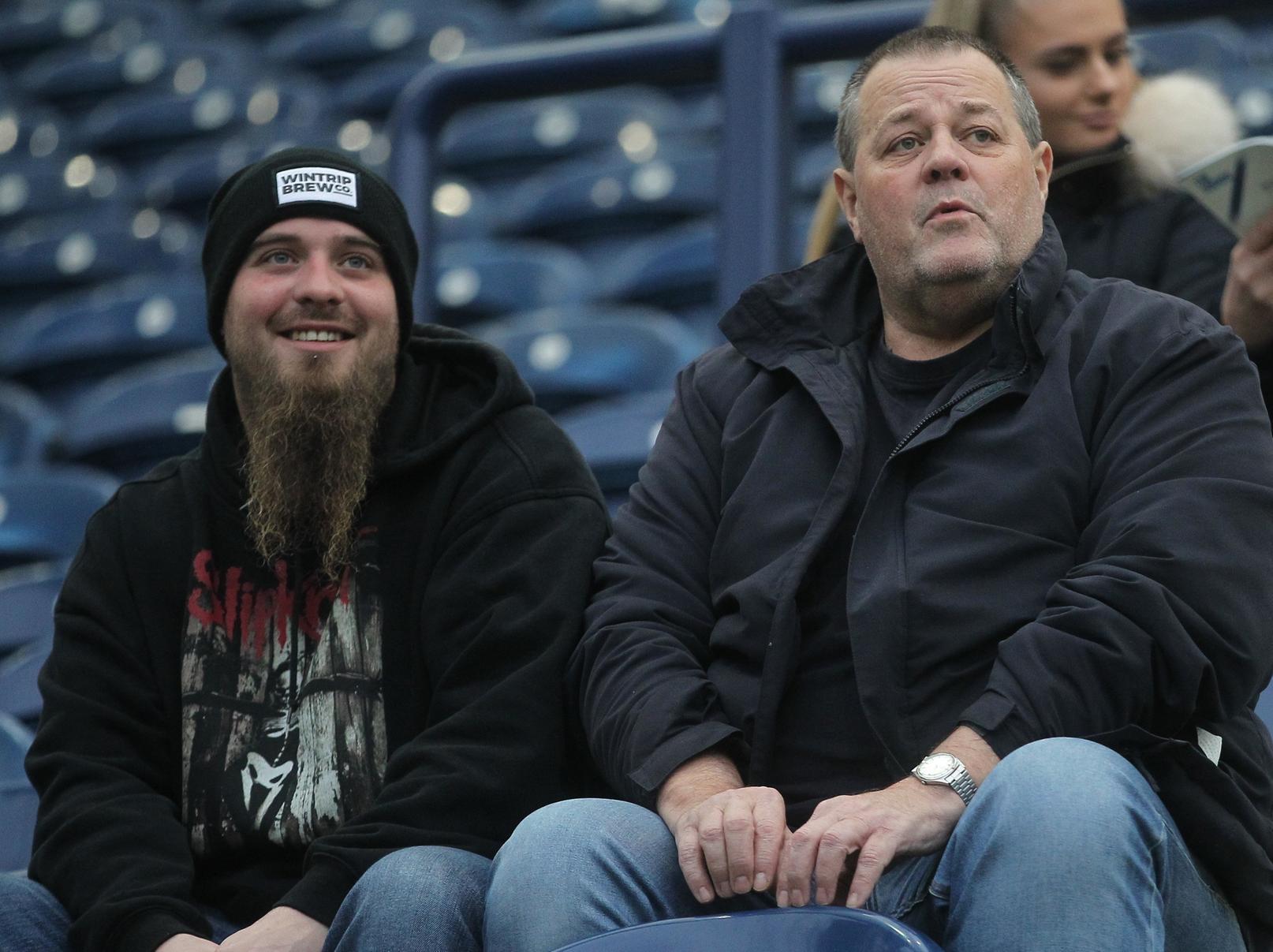 A pair of PNE fans look in good spirits as they wait for kick off.