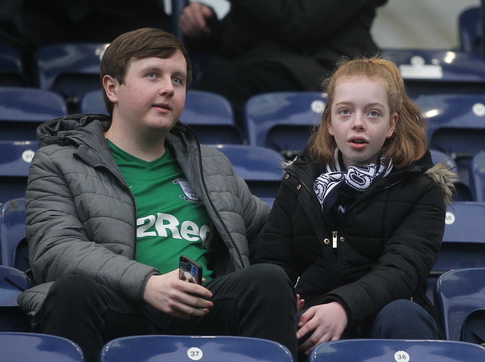 A Preston fan dons the green third kit for the home game against Millwall.