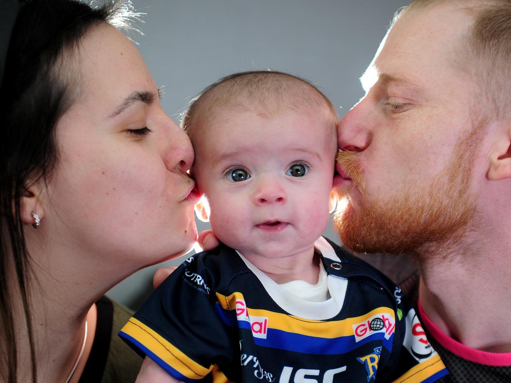 Six-month-old Maddison Holt from Gipton with mum Natasha and dad Rob. Photo by Simon Hulme.