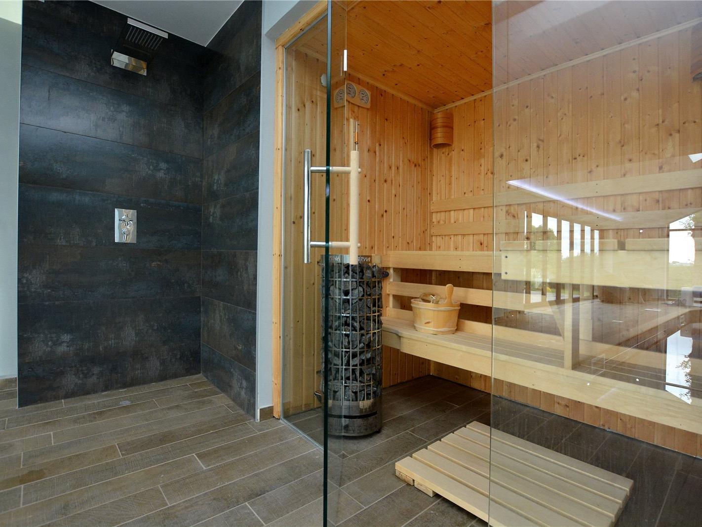 Relax and unwind after a workout in the pool in the house's very own sauna.