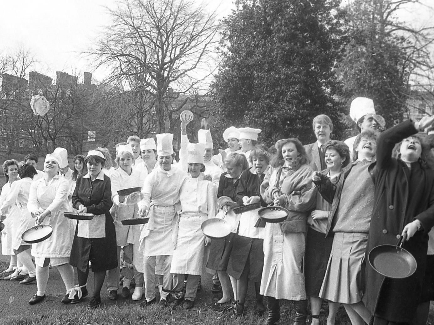 Passers-by watched in amazement as a crowd of pancake-tossing chefs raced across sedate Winckley Square in Preston. It was part of the annual Shrove Tuesday celebrations and 30 catering department students from Tuson College, armed with frying pans and pancakes, took part