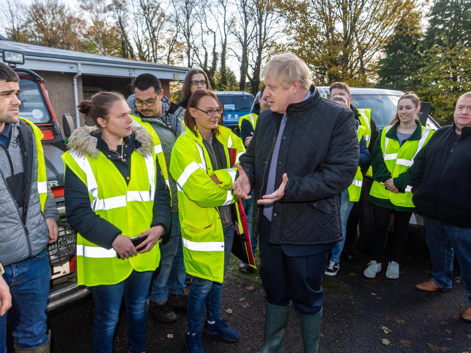 Boris Johnson visits the scene of major flooding in South Yorkshire last year.