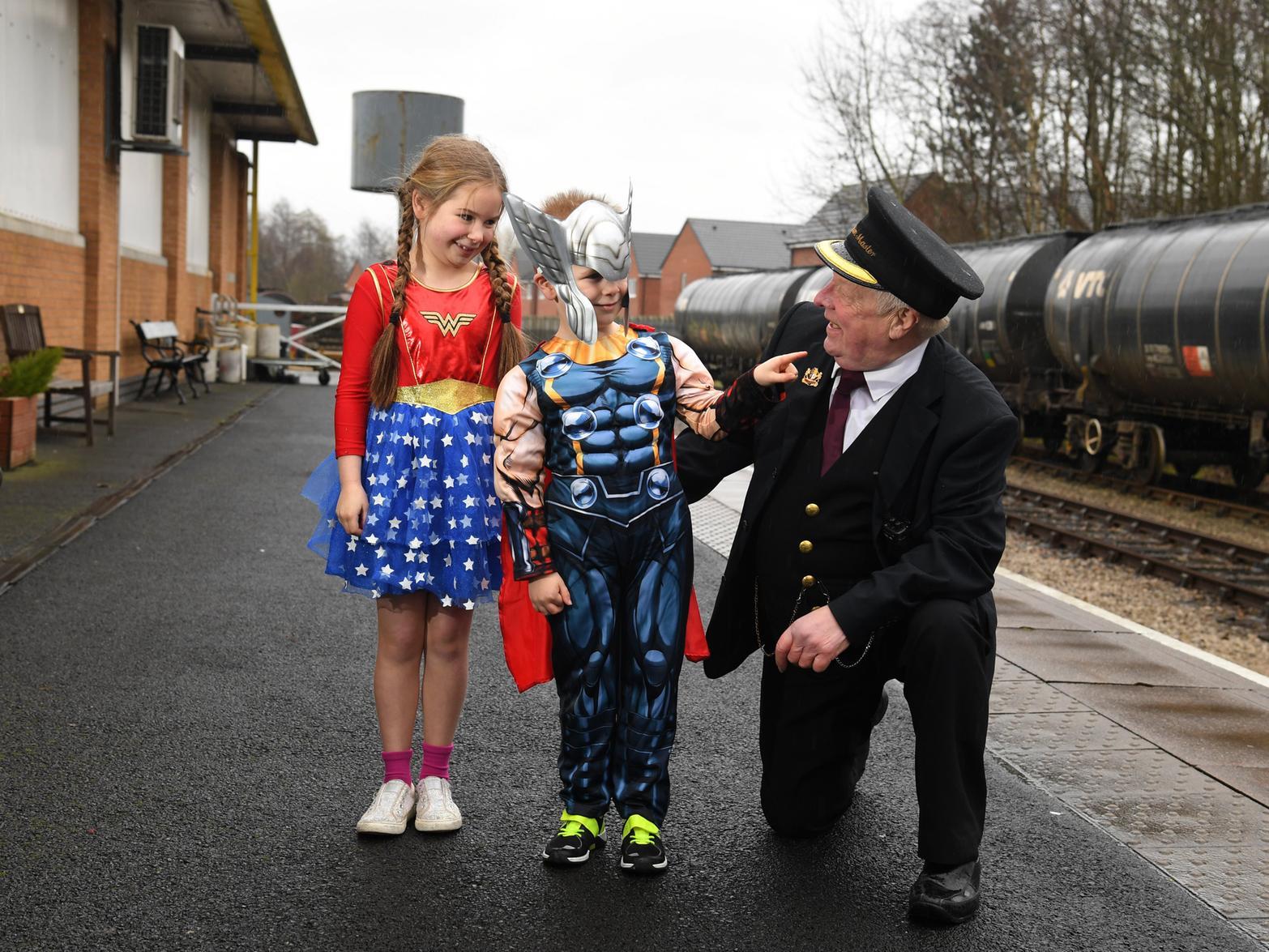 Superhero day at Ribble Steam Railway and Museum.
Rosie and James Yarrow with Station Master Dave Crosby.