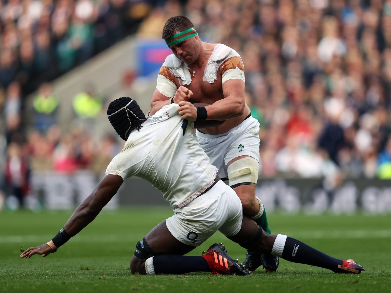 England's Maro Itoje (left) and Ireland's CJ Stander tussle during the Guinness Six Nations match at Twickenham Stadium. (David Davies/PA Wire).