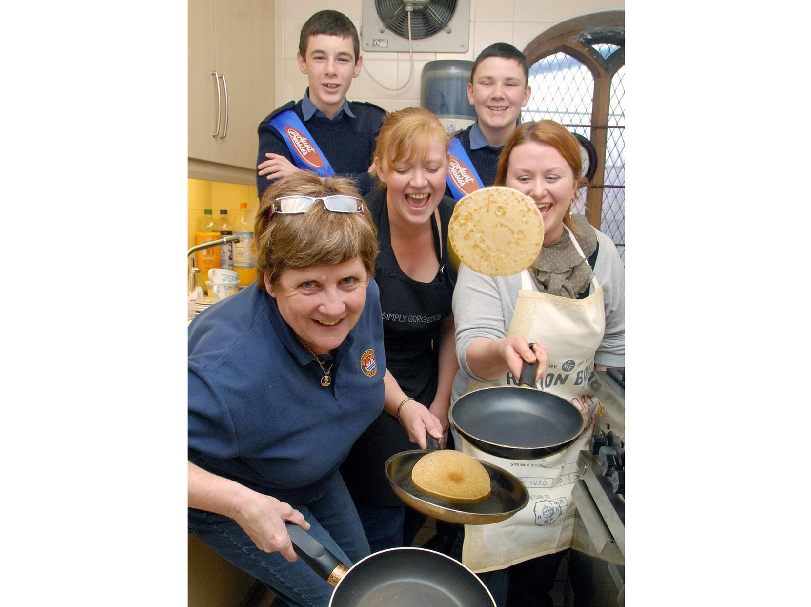 Julie Davies leads the team making pancakes at Scarborough Sea Cadets.
