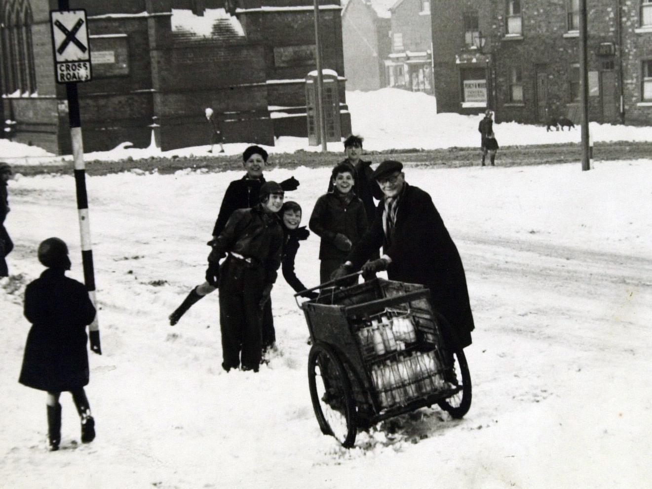 George Mitchell and his milk 'float' in winter of 1963 near Balm Road, Hunslet.