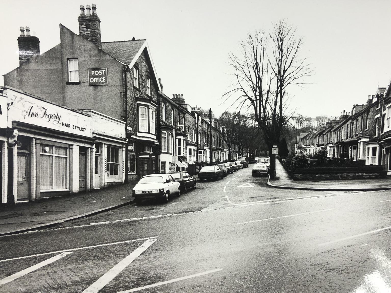 This corner has changed quite a lot since this picture was taken. New flats now stand where the hair stylist was and the Post Office is an accountants. There was no date on this picture - do you know which era it is from?