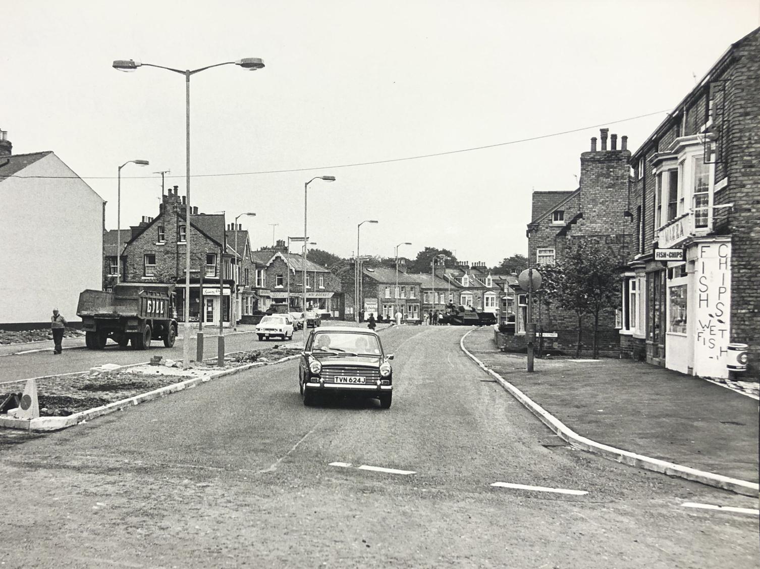 The vehicles looked very different in 1976 but there was still a fish and chip shop on the corner of Prospect Road roundabout.