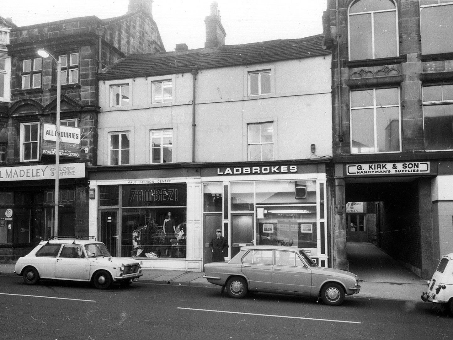 West side of Kirkgate. Pictured, right to left, Freeman Hardy Willis footwear, G. Kirk & Son, handyman's supplies, Ladbrokes, Zambezi ladies' and men's wear and the vacant Paul Madeley's Colour Centre.