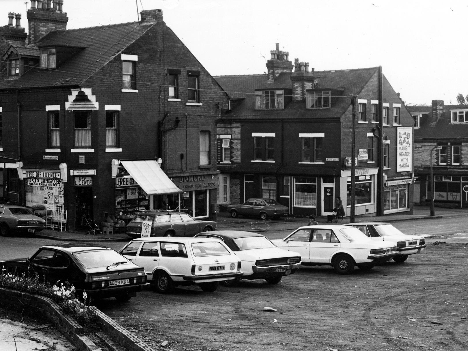 Ashley Road showing junctions with Florence Street, Scarth Avenue and Ashley Terrace. Shops in view are DJ's greengrocers and off licence, Diamond Taxis, a fish and chip shop and Patrick Alan's hairdressers.