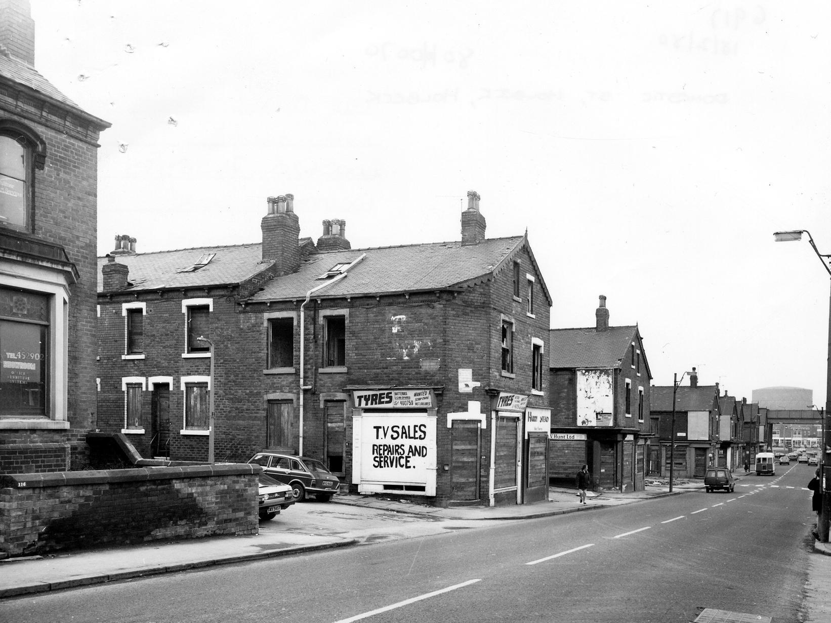 Domestic Street towards the railway viaduct. Houses and shops on Willoughby Avenue in the foreground, then Willoughby Grove, Willoughby Place and other Willoughbys, are all boarded up, were due to be demolished.