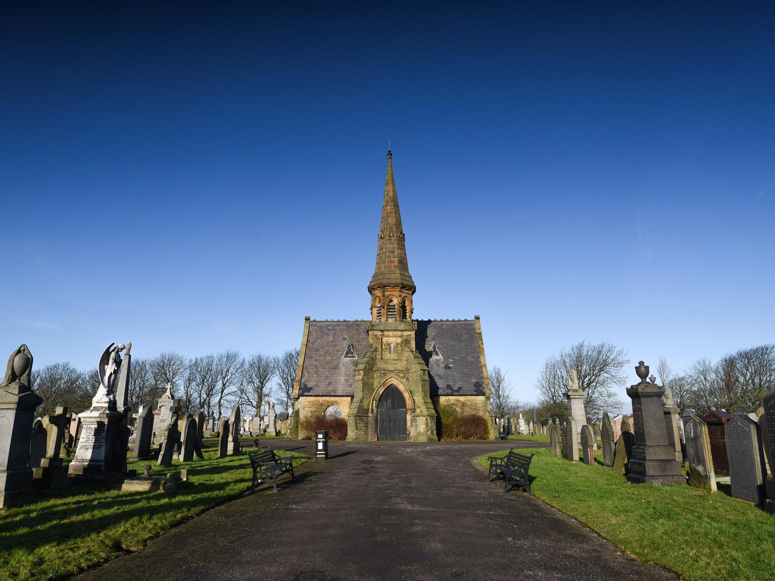 Mortuary chapel. Single tall storey, 3 bays, with a central 3-stepped-stage tower, the lower stage an entrance porch