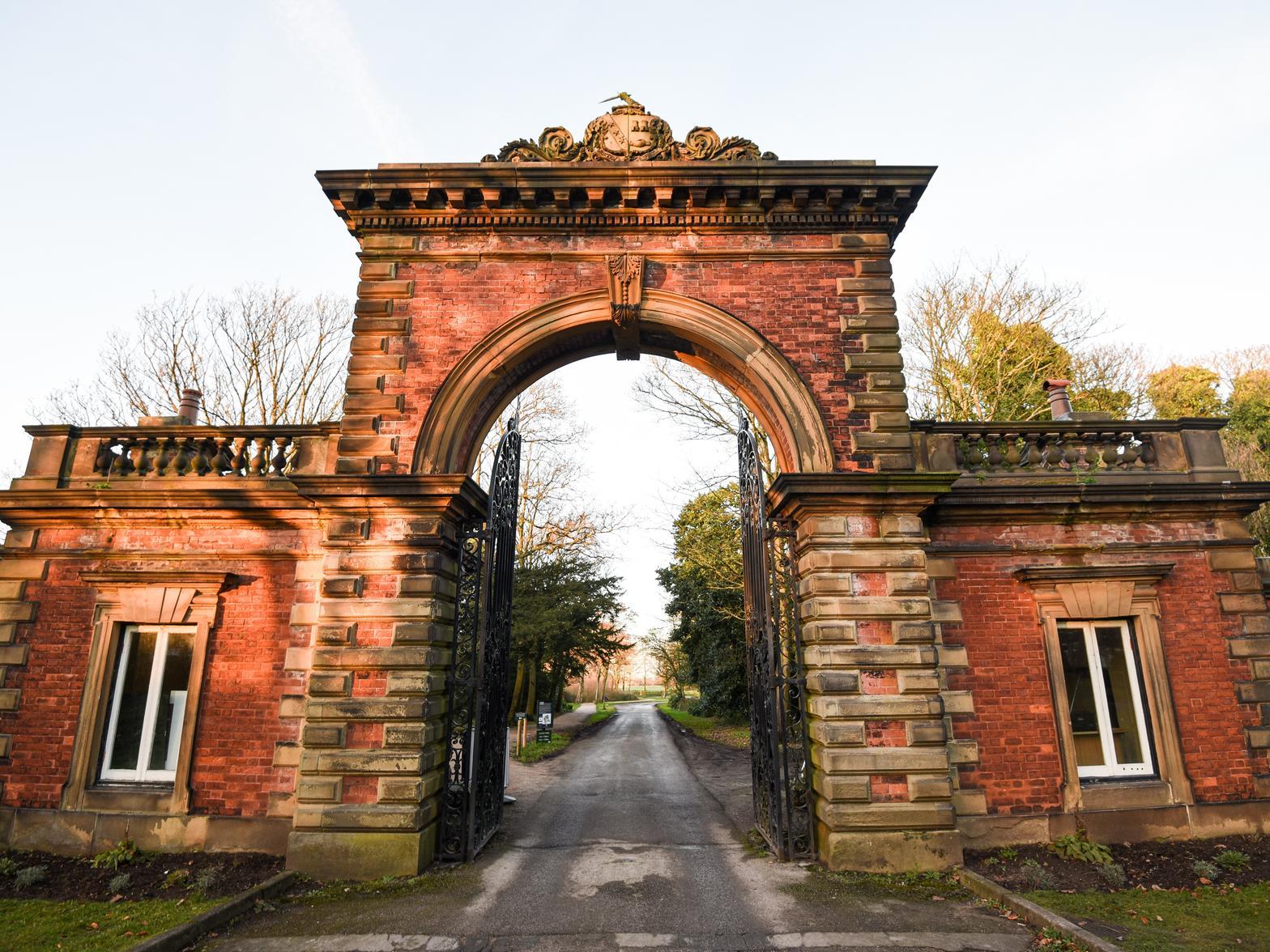 Entrance archway with integral lodges. Probably 1840s, originally sited adjacent to the (former) Estate Office in Hastings Place and removed to this site after that approach to the Hall was interrupted by the Lytham-Blackpool Railway (1861-3)