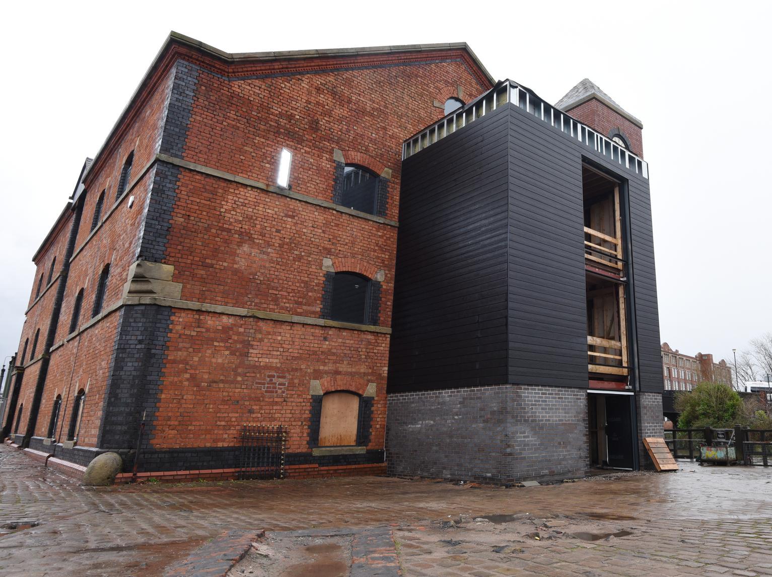 Outside the former pub, The Orwell, at the Wigan Pier redevelopment
