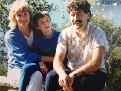 Lewis Keogh pictured as a boy with father Peter and mother Sadie