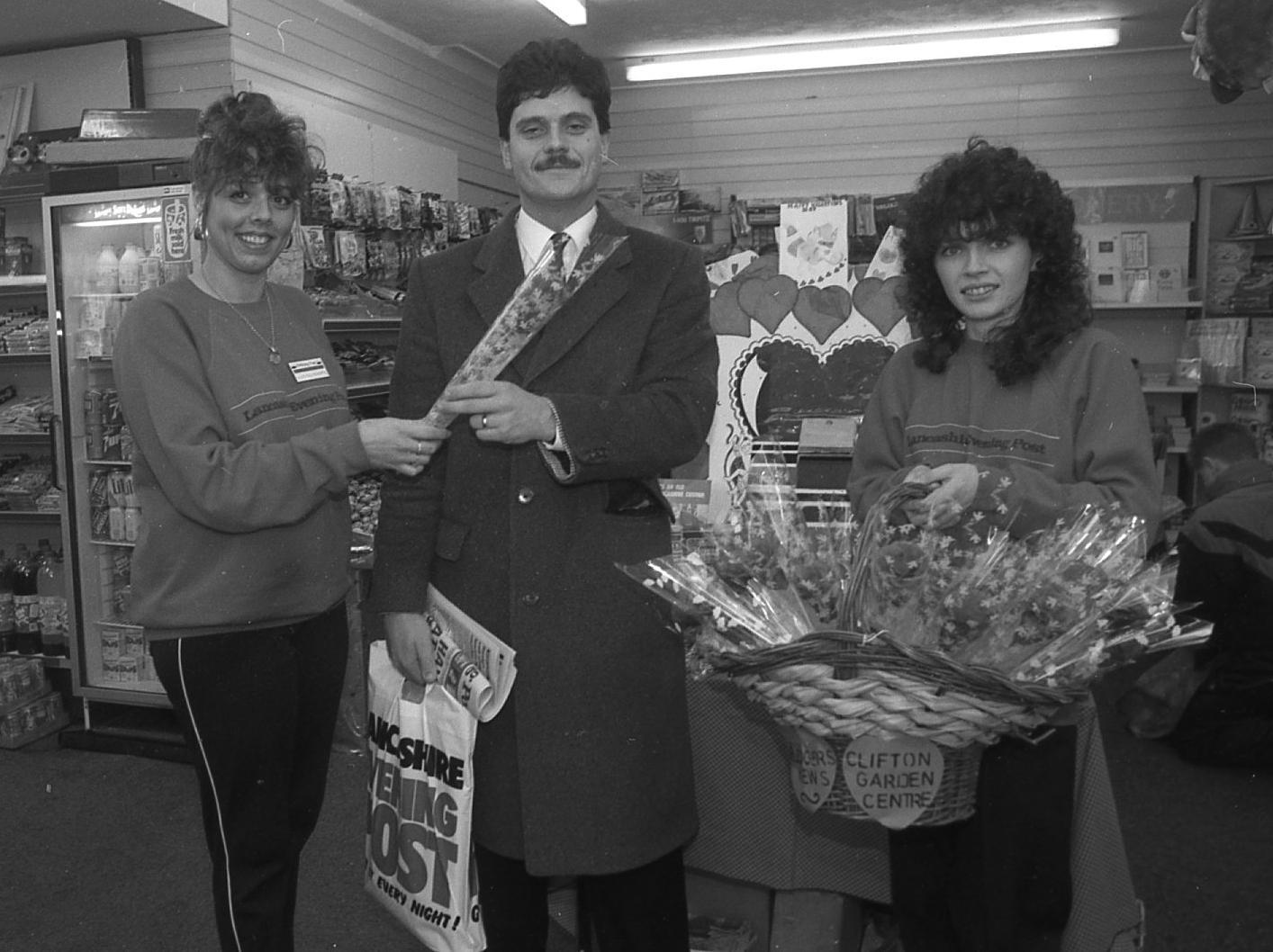 A red rose for a well-read customer was the order of the day at a special St Valentine's party in Kirkham. Pledgers News on Poulton Street was visited by the Evening Post promotions girls, waiting to hand out red roses - supplied by Clifton Garden Centre - to people buying the newspaper. Chris Halliday (pictured) was obviously pleased with his romantic gift, presented by Julie Hollingworth