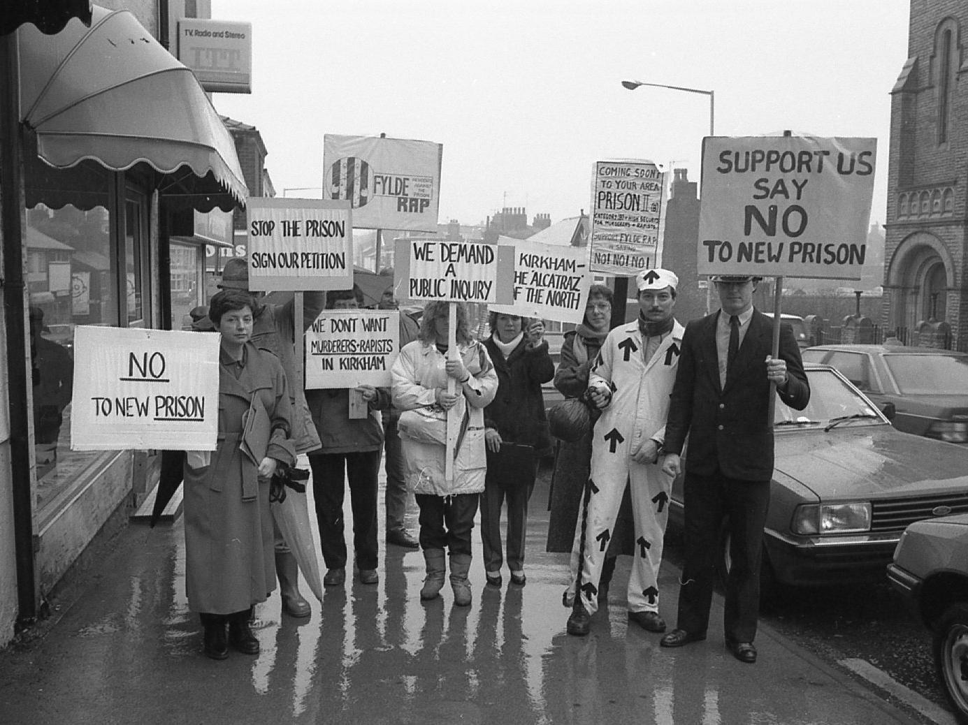 Residents of a Lancashire town took the streets to protest at plans for a high-security prison to be built on their doorsteps. Fylde RAP (Residents Against the Prison) braved the rain to tour round the centre of Kirkham collecting signatures for a petition and make local people aware of the scale of the proposed prison next to the Open Prison in the town