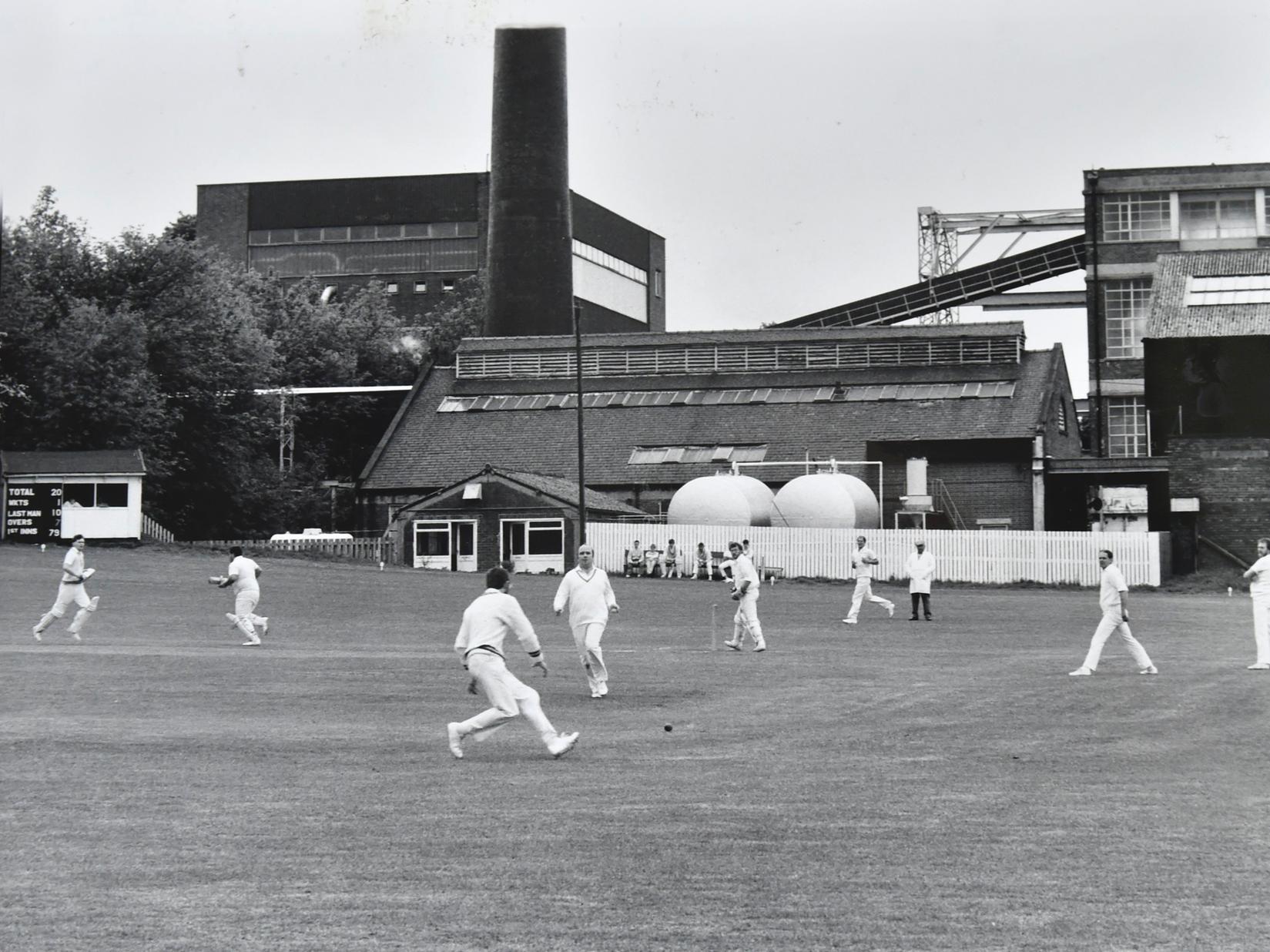 Cricket in Wharfedale in the shadow of the mills that gave Pool Mills their name.