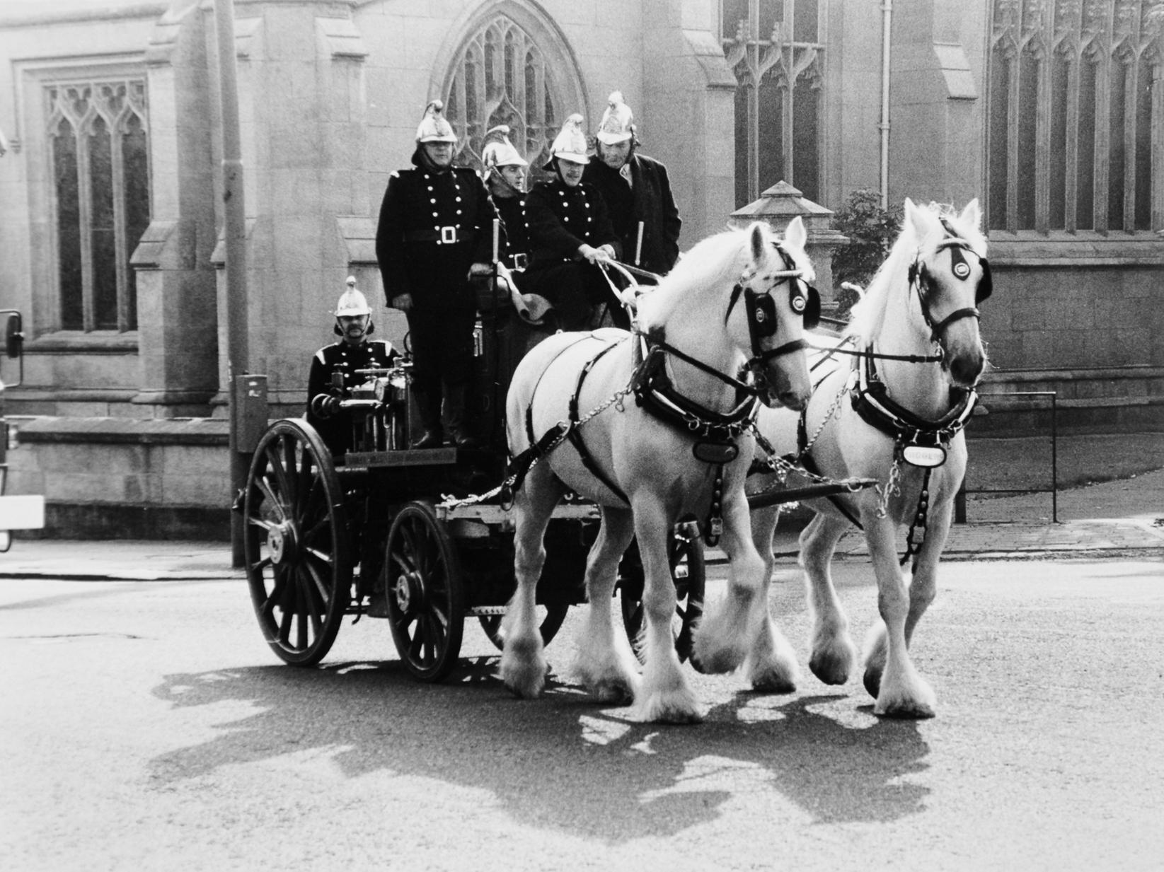 Firefighters and Tetley's horsemen pass Leeds Parish Church on this 1891 fire engine which was pulled through the city to commemorate the 50th anniversary of Gipton Fire Station.