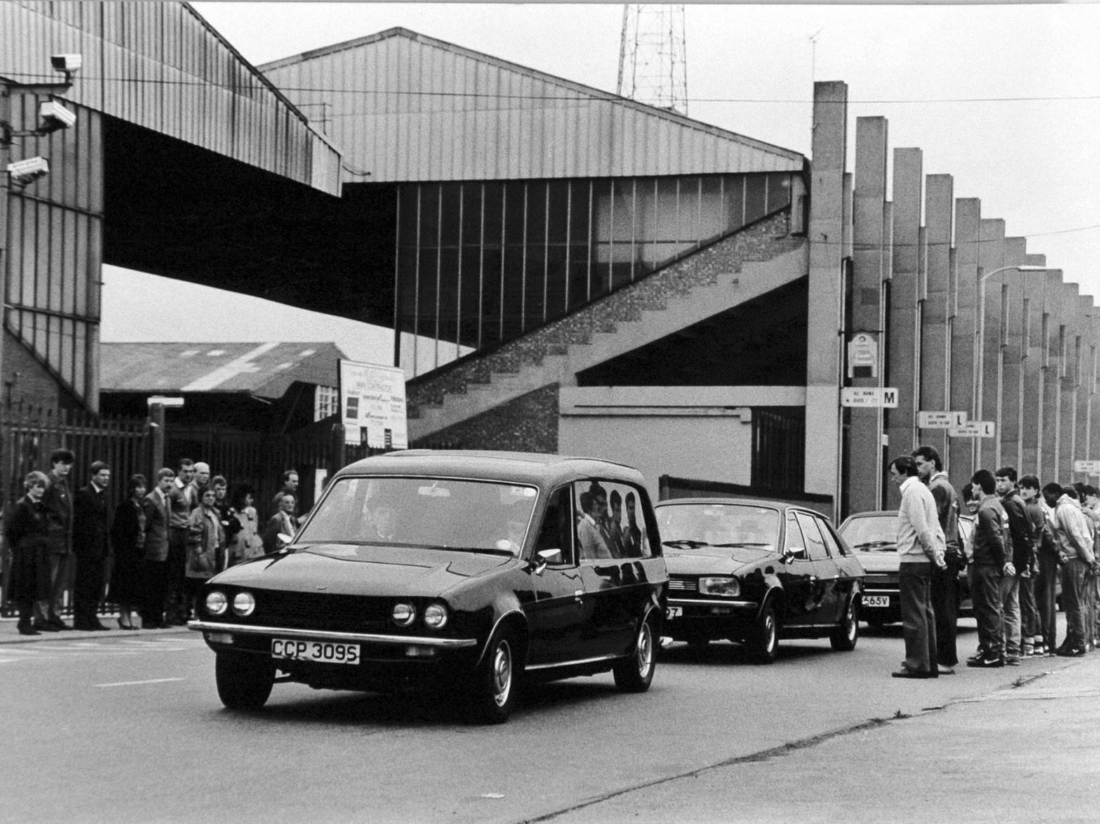 The funeral procession for Leeds United chairman Manny Cussins travels along Elland Road.
