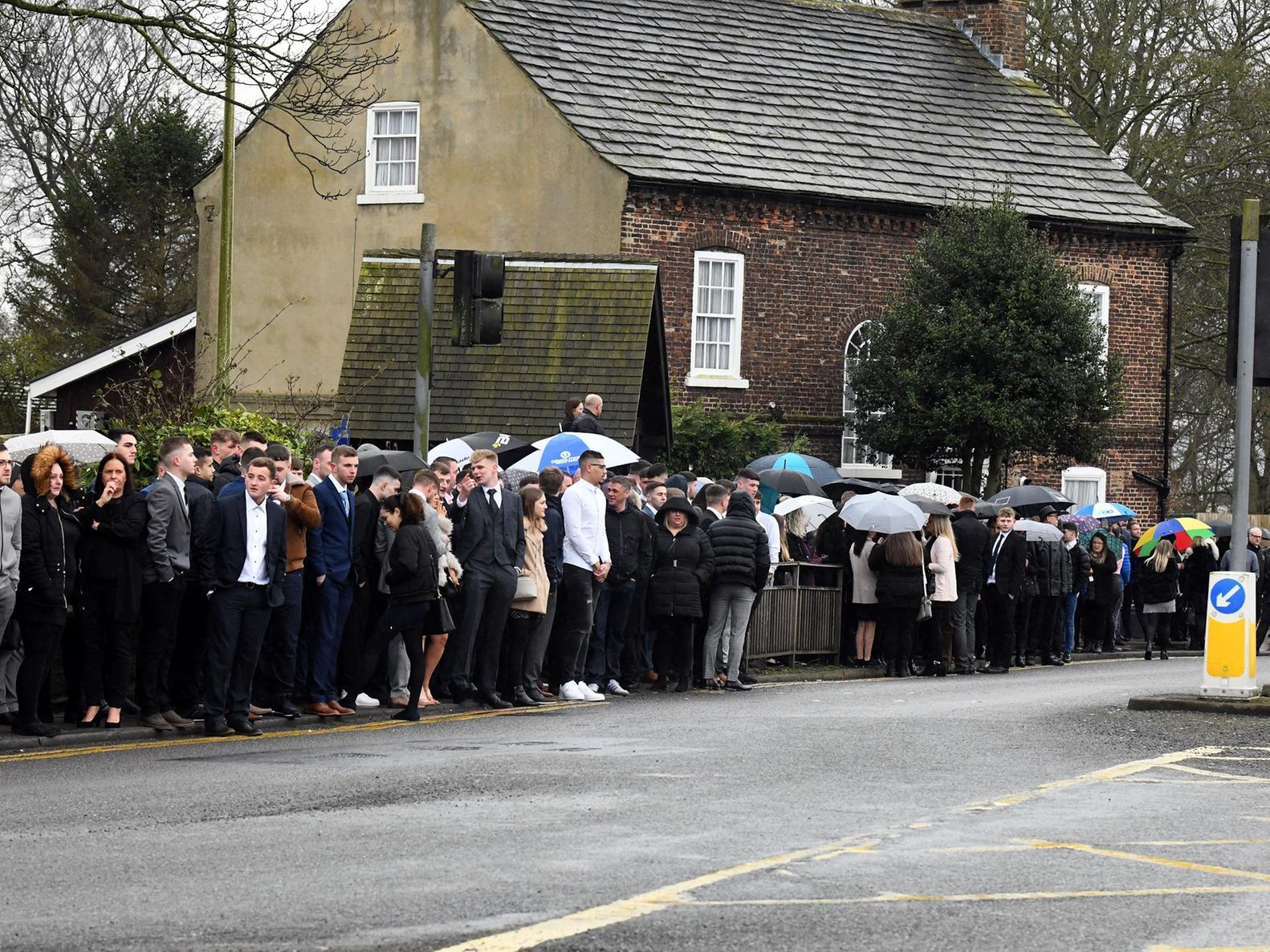 Hundreds waited for Luke's funeral procession.