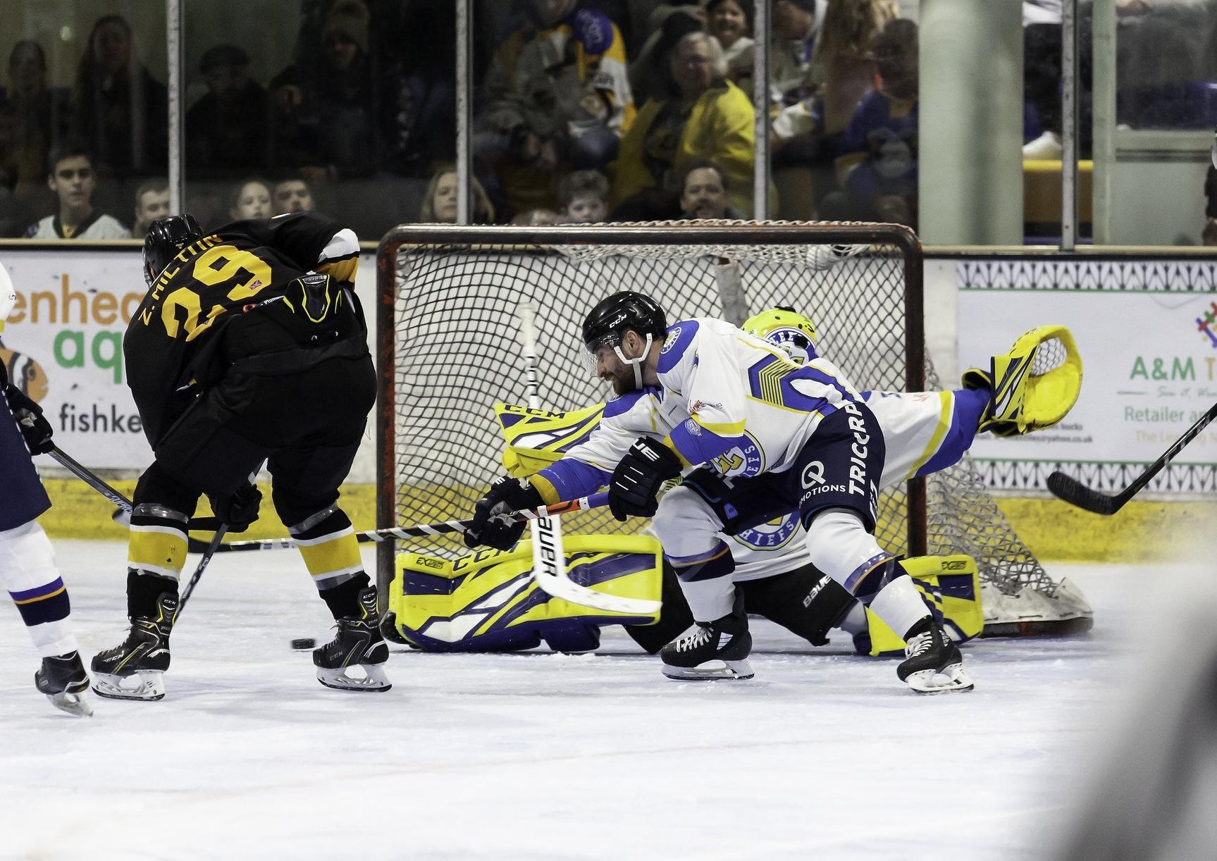 Leeds Chiefs' player-coach Sam Zajac
battles in vain to stop another Bracknell Bees goal in December's 11-1 defeat for his team in Berkshire.
Picture courtesy of Kevin Slyfield