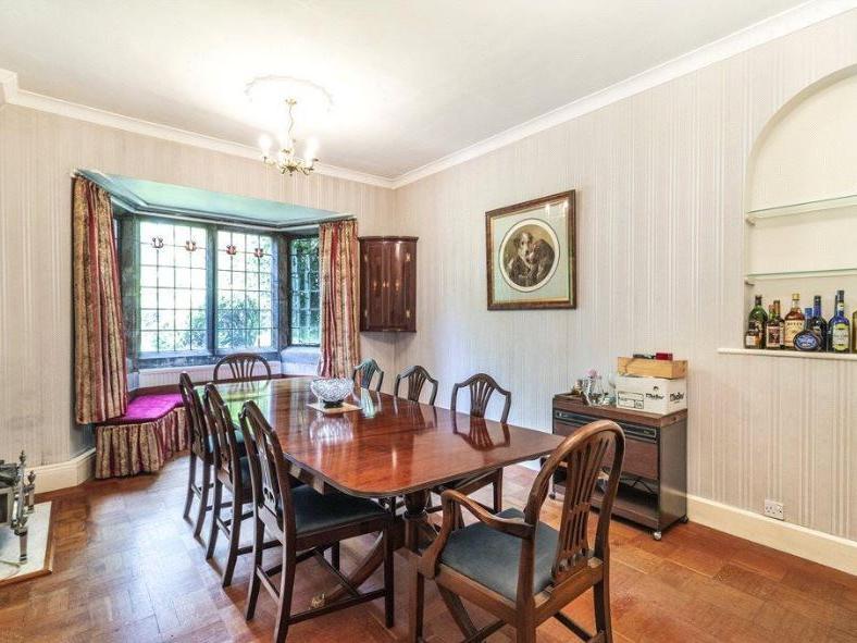 The dining room provides a cosy space for family meals, and can be used for larger functions.