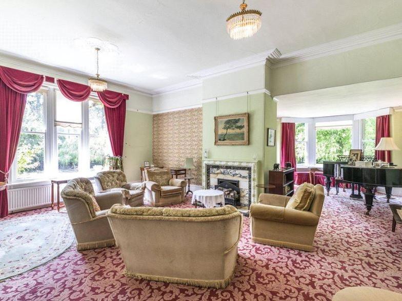 The grand drawing room is the largest of the propertys three reception rooms and is ideal for relaxing and entertaining.