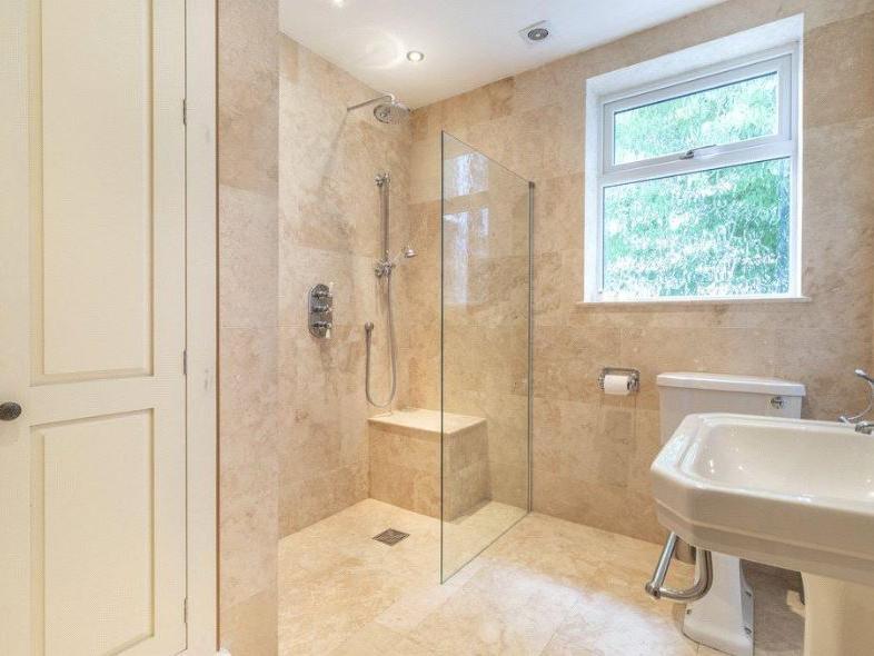 As well as an en-suite in the master bedroom, the property also features a modern house bathroom.