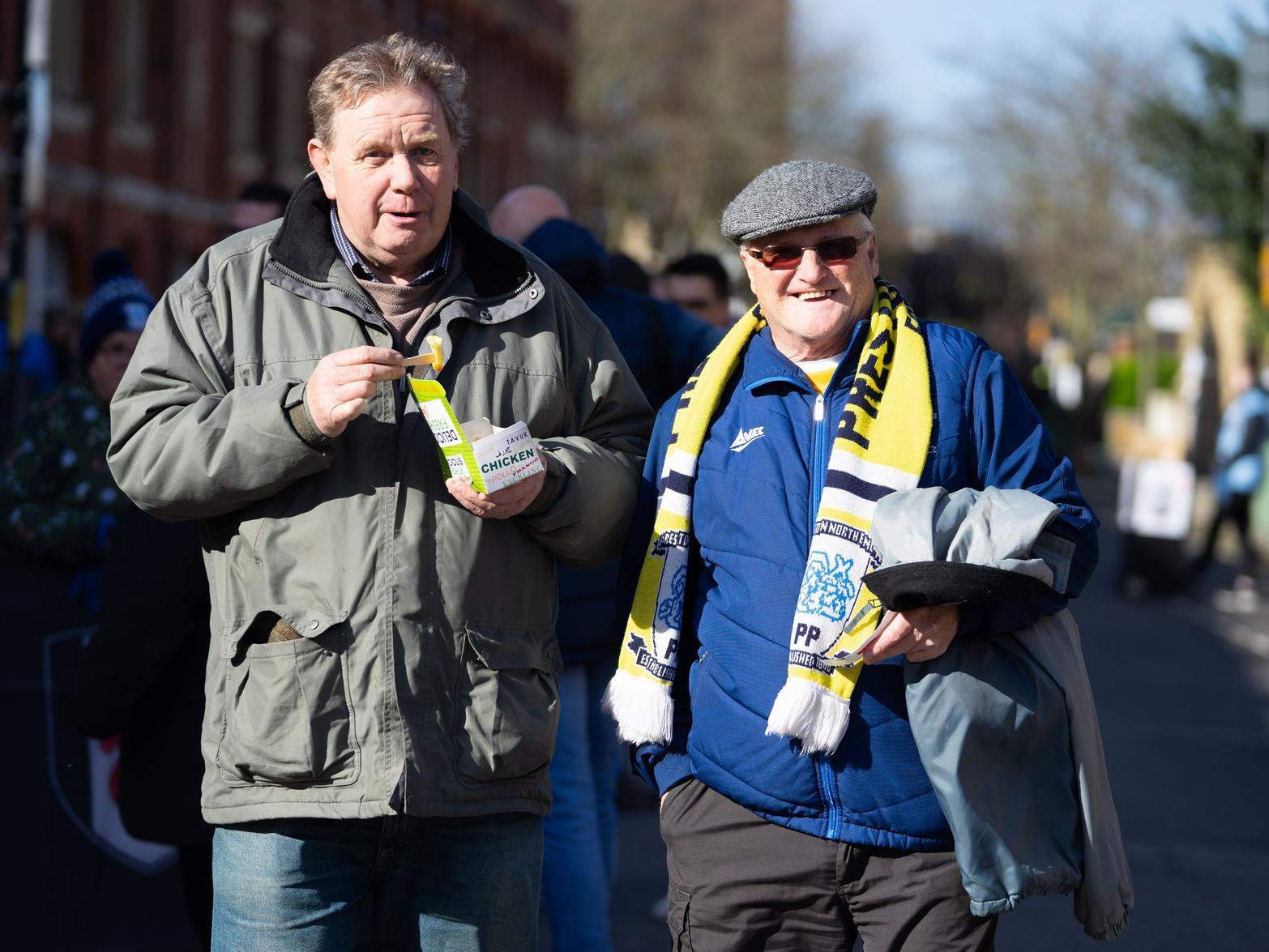 Two PNE fans pose for our camera outside Craven Cottage.