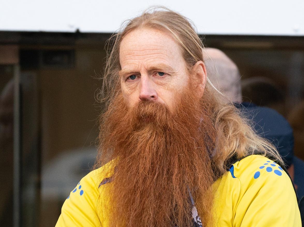 A Preston fan sports a beard so long it can't all fir into the picture on a chilly day in London.