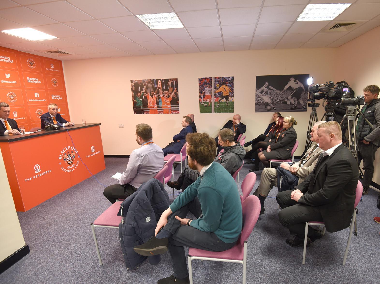 Neil Critchley speaking during the press conference