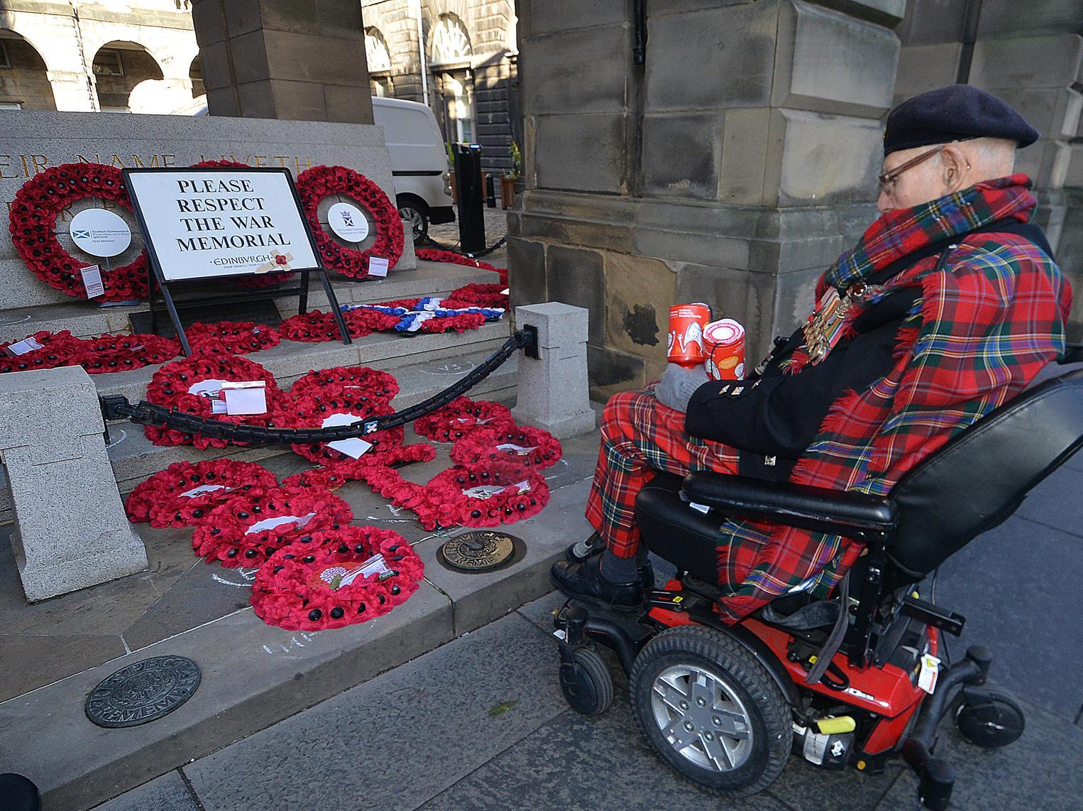 Tom paying his respects at the Edinburgh City Chambers war memorial
