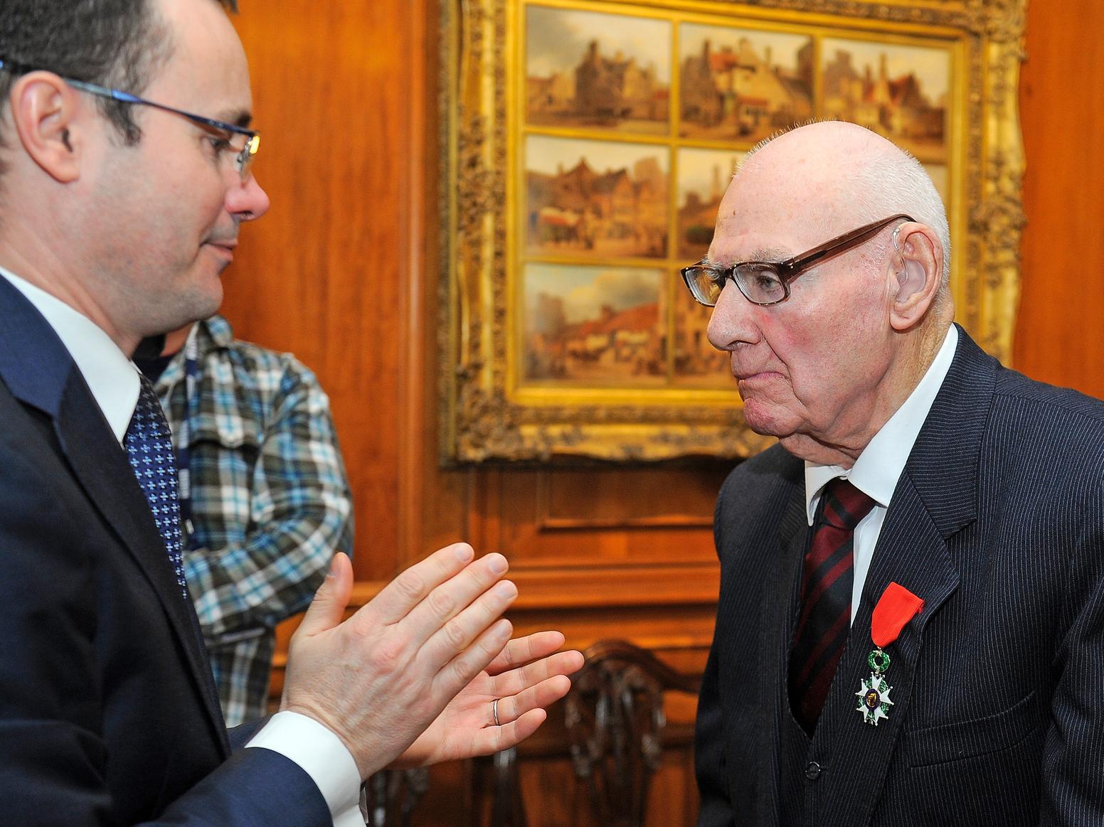 The French Consul General, Emmanuel Cocher, presented the Chevalier de la Legion d'Honneur medals, Frances highest National Order, to five Scottish veterans, including Tom in 2016.