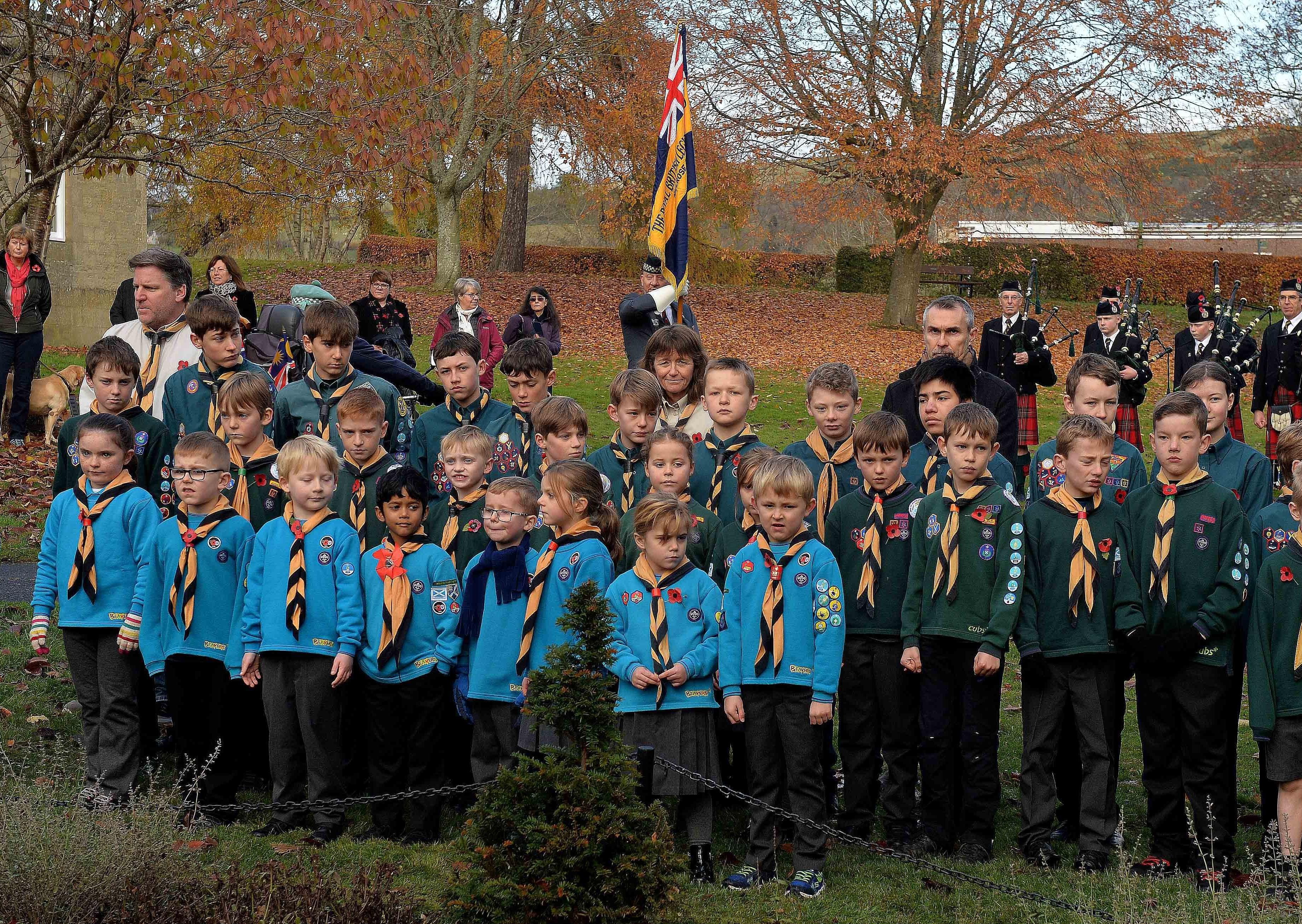 The town's Beavers and Cubs pay their respects.
