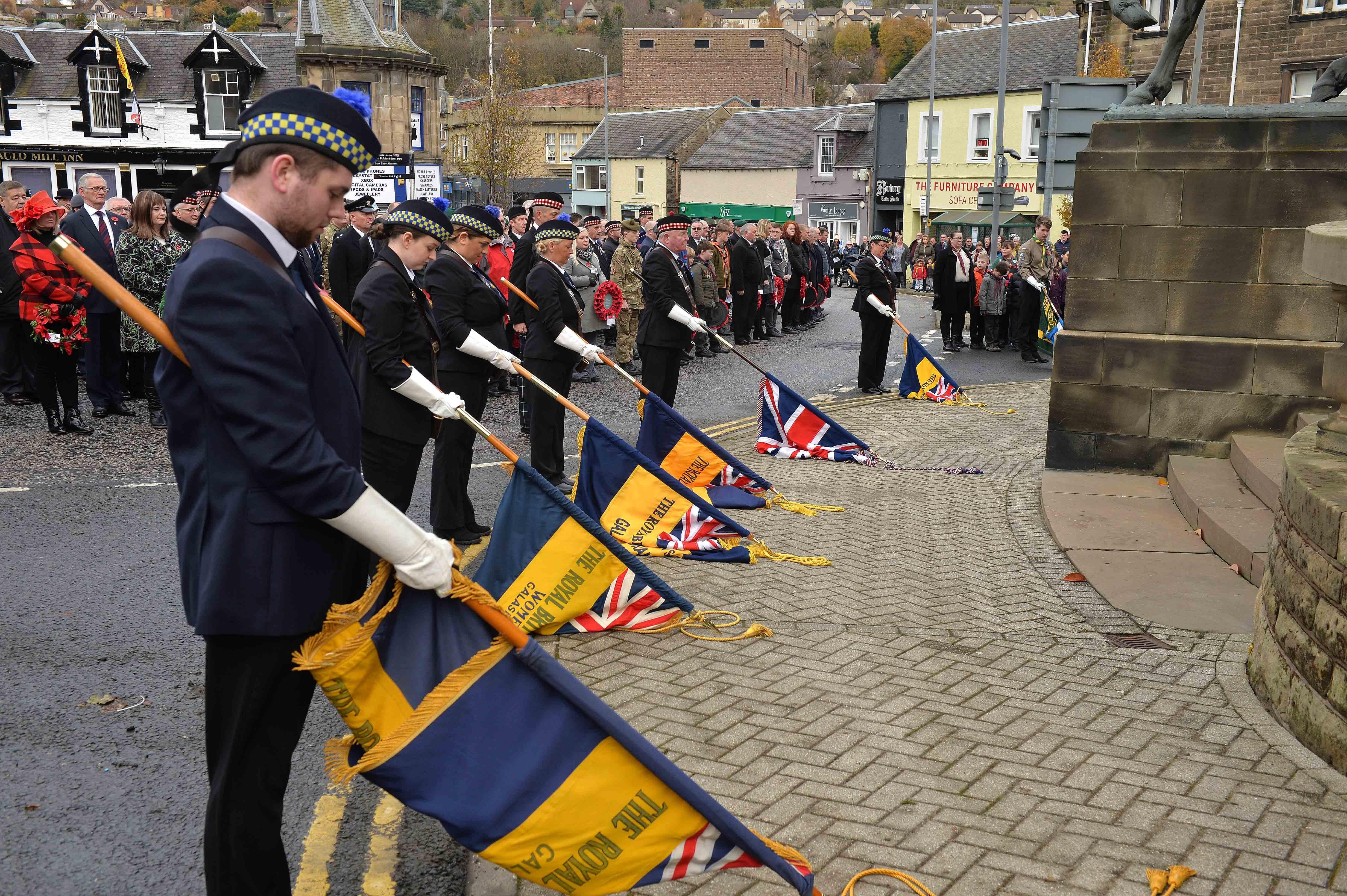 Flags are dipped during the act of remembrance in Galashiels.