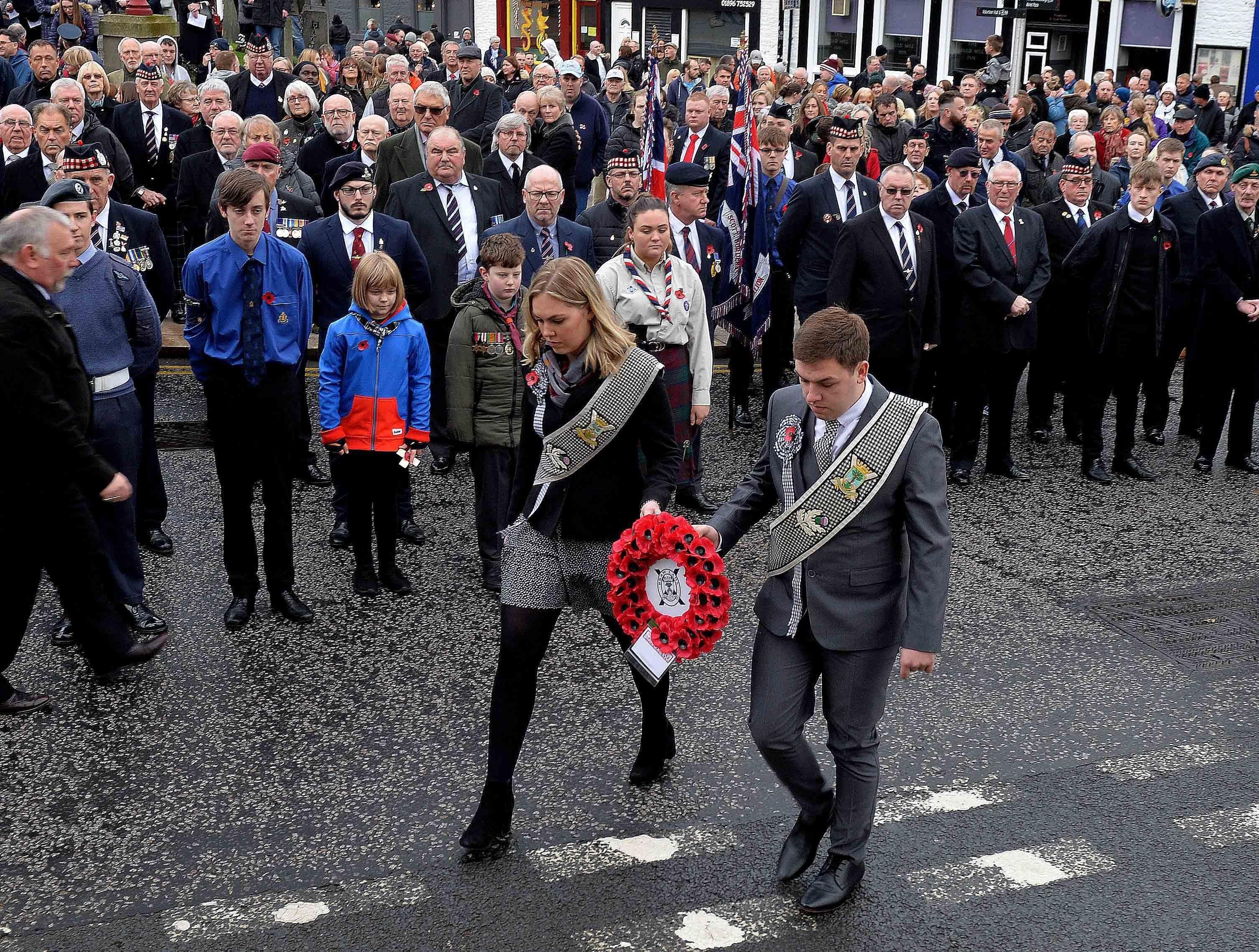 Braw Lad Robbie Lowrie and Braw Lass Nicola Laing lay a wreath in Galashiels.