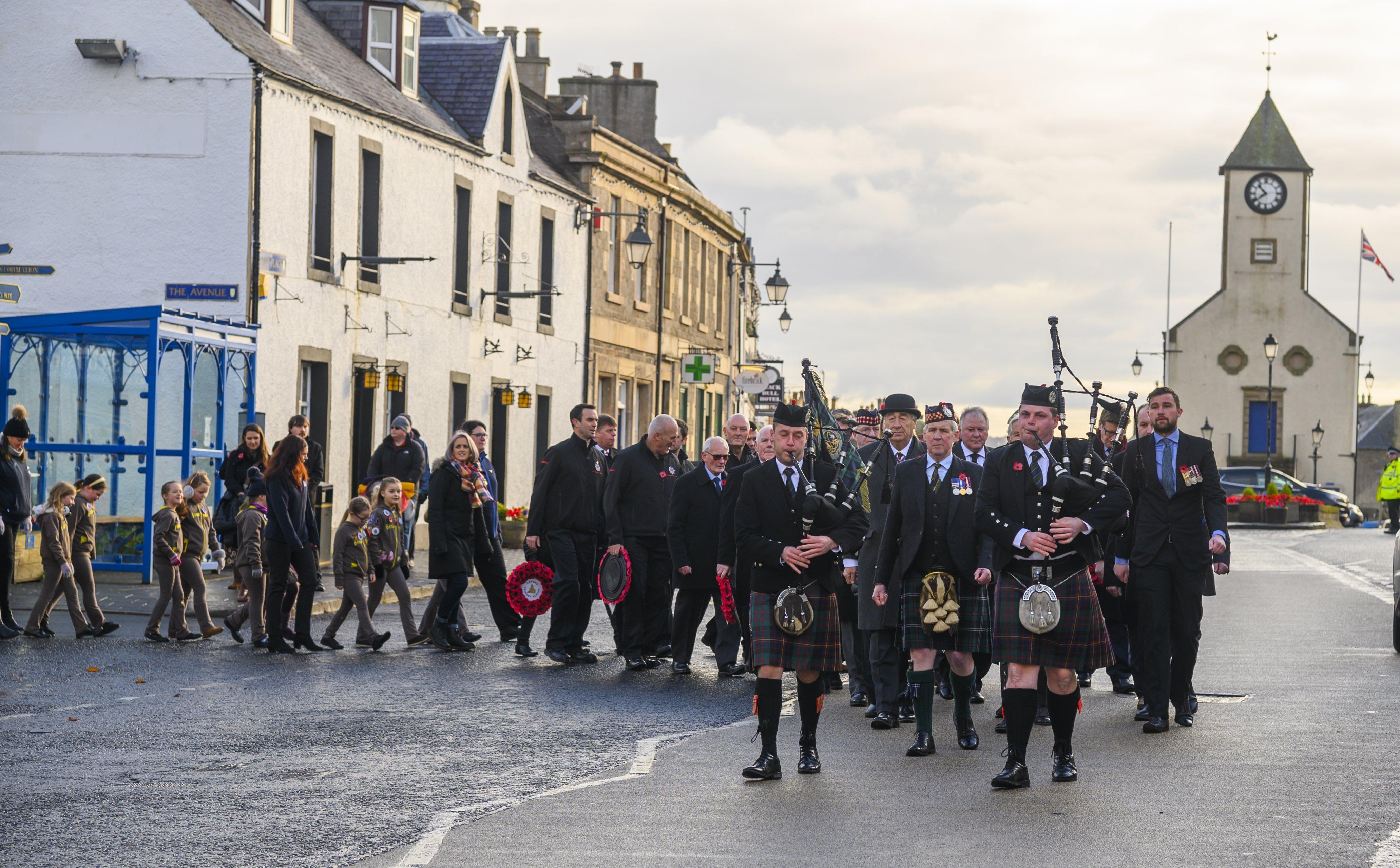 Pipers Euan Craig and Callum Atkinson lead the remembrance parade in Lauder.