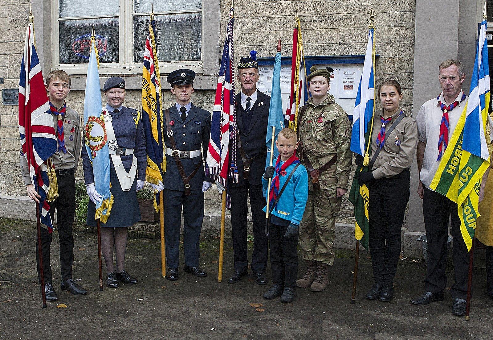 Standard bearers after the remembrance parade in Jedburgh.
