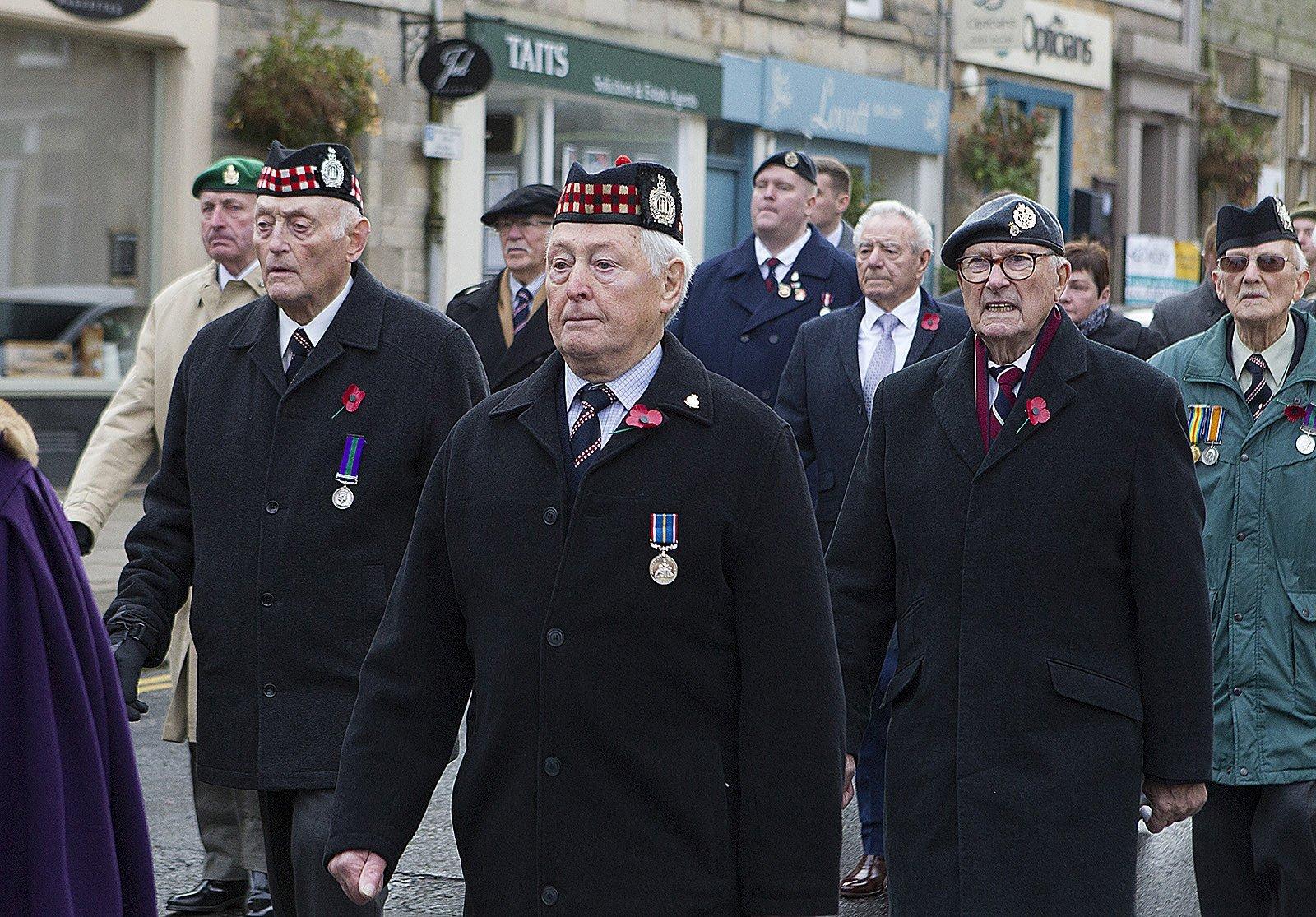 Charlie Murdock, Gary Scott and George Patterson in the remembrance parade in Jedburgh.