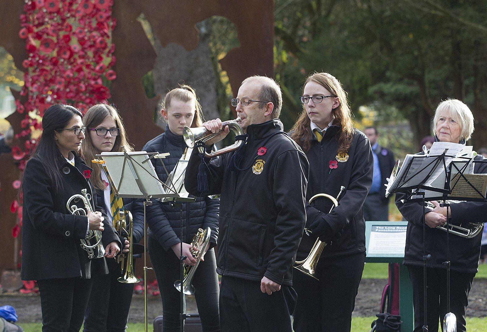 Steve Hewson plays the bugle at Hawick's act of remembrance.