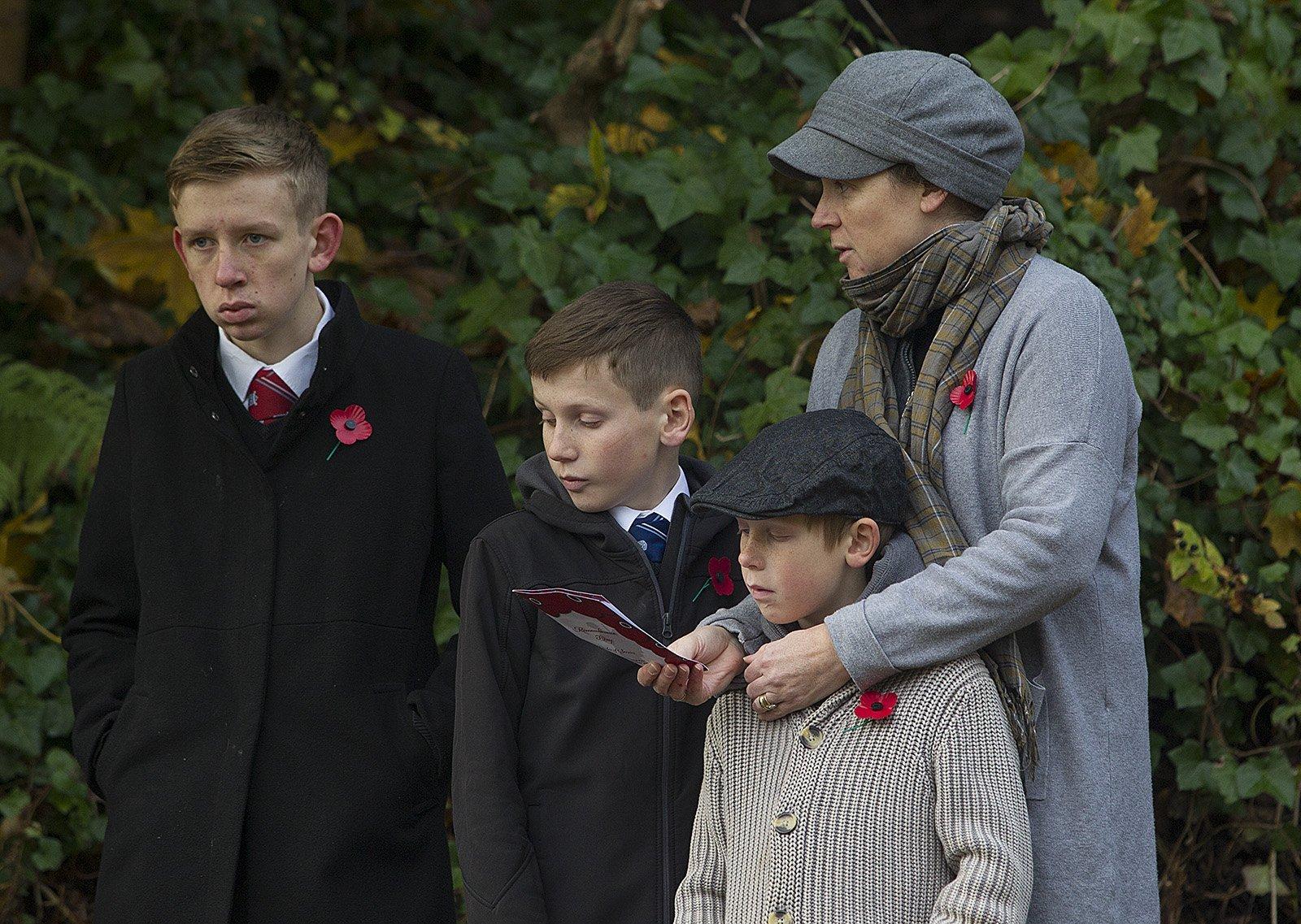 Families pay their respects in Hawick.