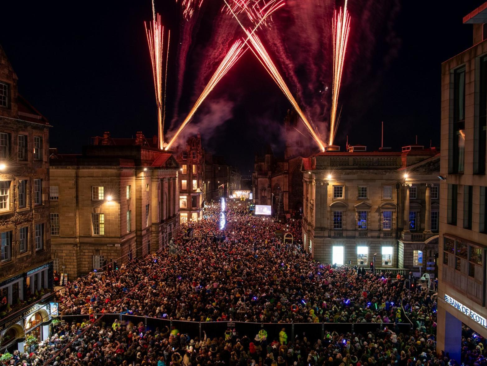 A firework display lit up the Royal Mile to signify the beginning of Edinburgh's Christmas festival