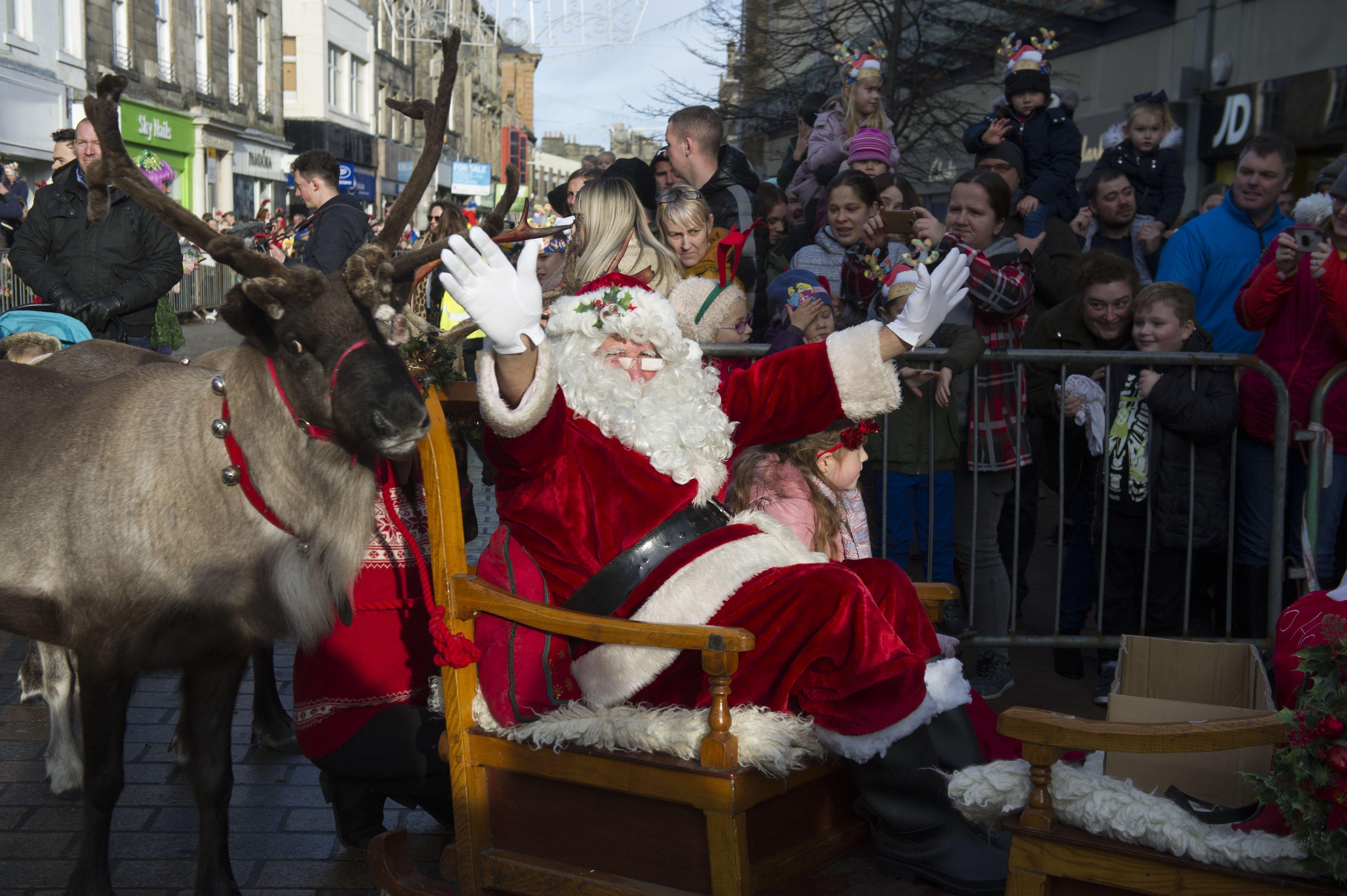 Mercat Reindeer Parade in Kirkcaldy on Sunday, November 17. Santa with Zoe Harbour on the sleigh. Picture by George McLuskie.