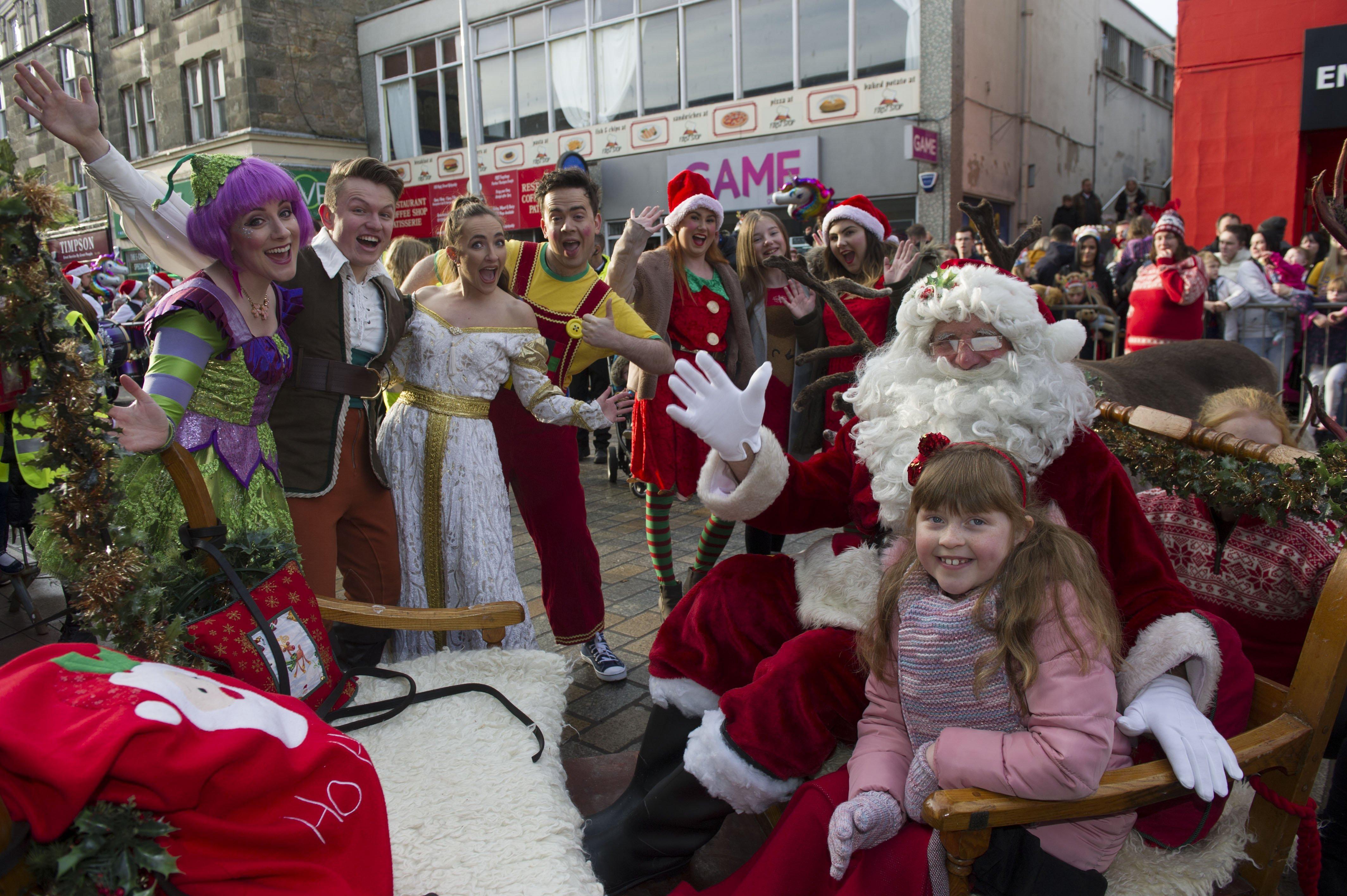 Mercat Reindeer Parade in Kirkcaldy on Sunday, November 17. Santa with Zoe Harbour on the sleigh and the cast from this year's pantomime. Picture by George McLuskie.