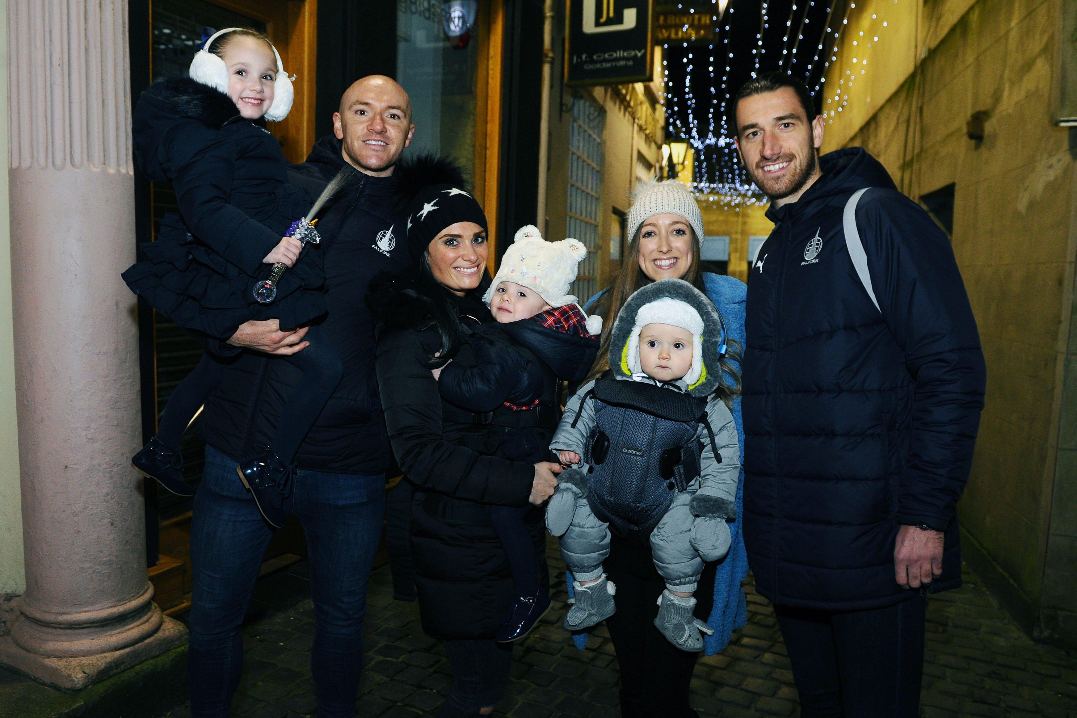 Falkirk Christmas lights switch on, Falkirk High Street, Sunday, November 17. Falkirk FC's Conor Sammon and Gregor Buchanan with their families. Picture by Michael Gillen.