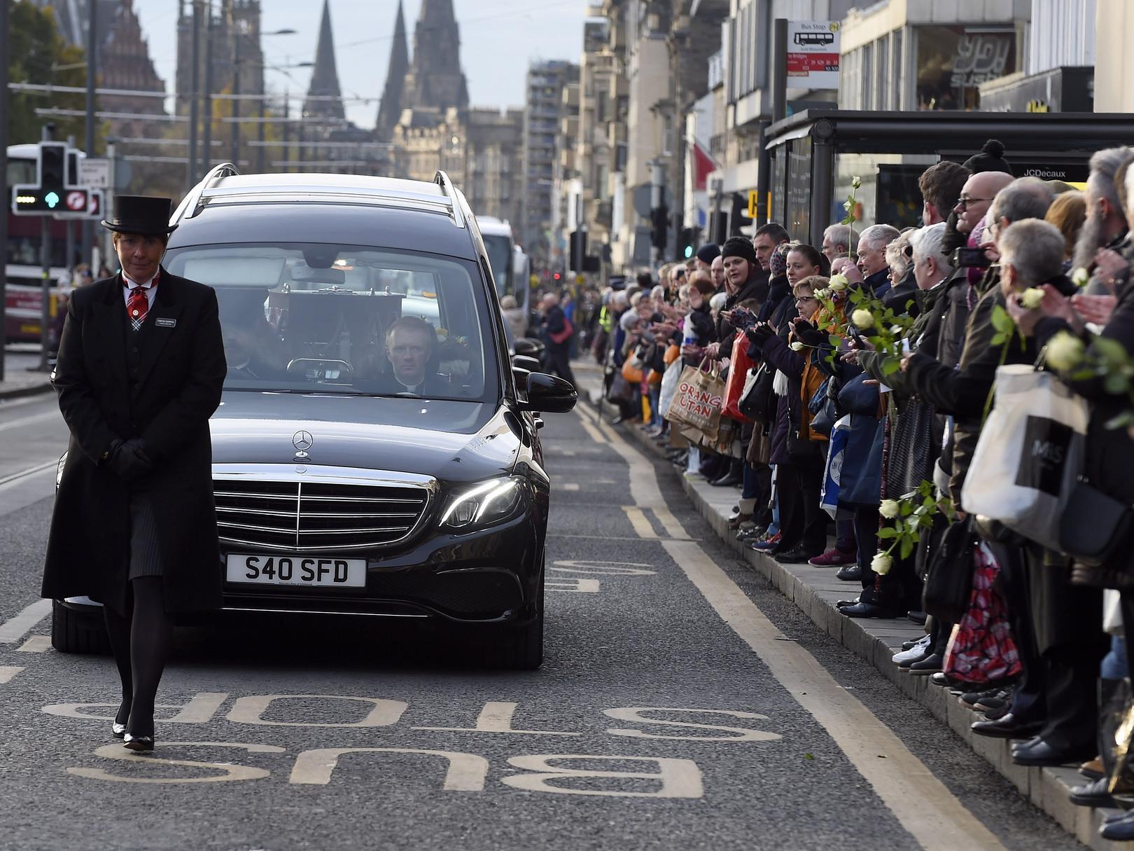 Hundreds lines Princes Street as the funeral cortege passed.