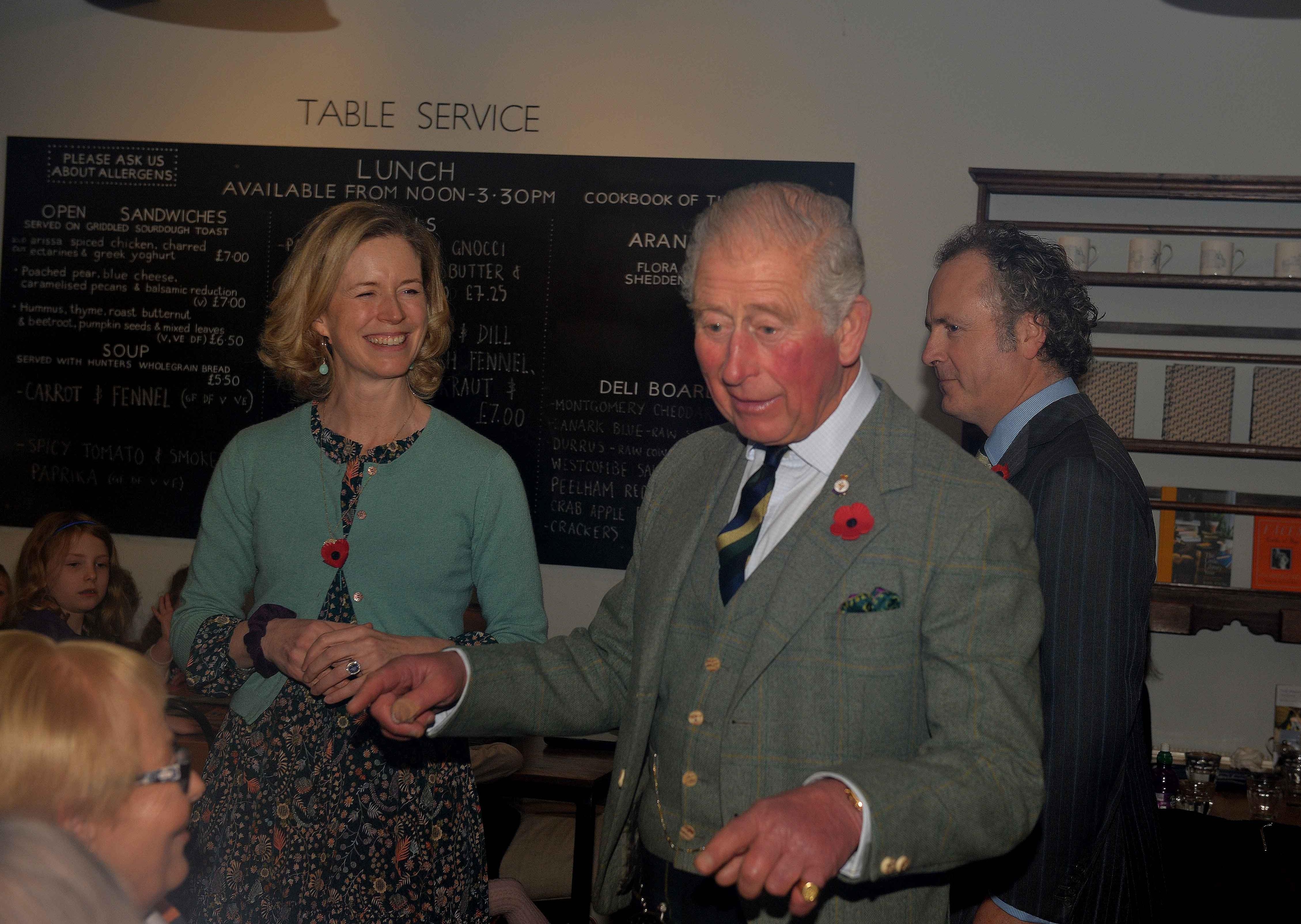 The Duke of Rothesay speaks with diners in the cafe.